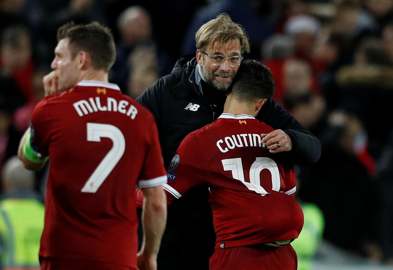Soccer Football - Champions League - Liverpool vs Spartak Moscow - Anfield, Liverpool, Britain - December 6, 2017   Liverpool manager Juergen Klopp, Philippe Coutinho and James Milner celebrate after the match                   REUTERS/Phil Noble