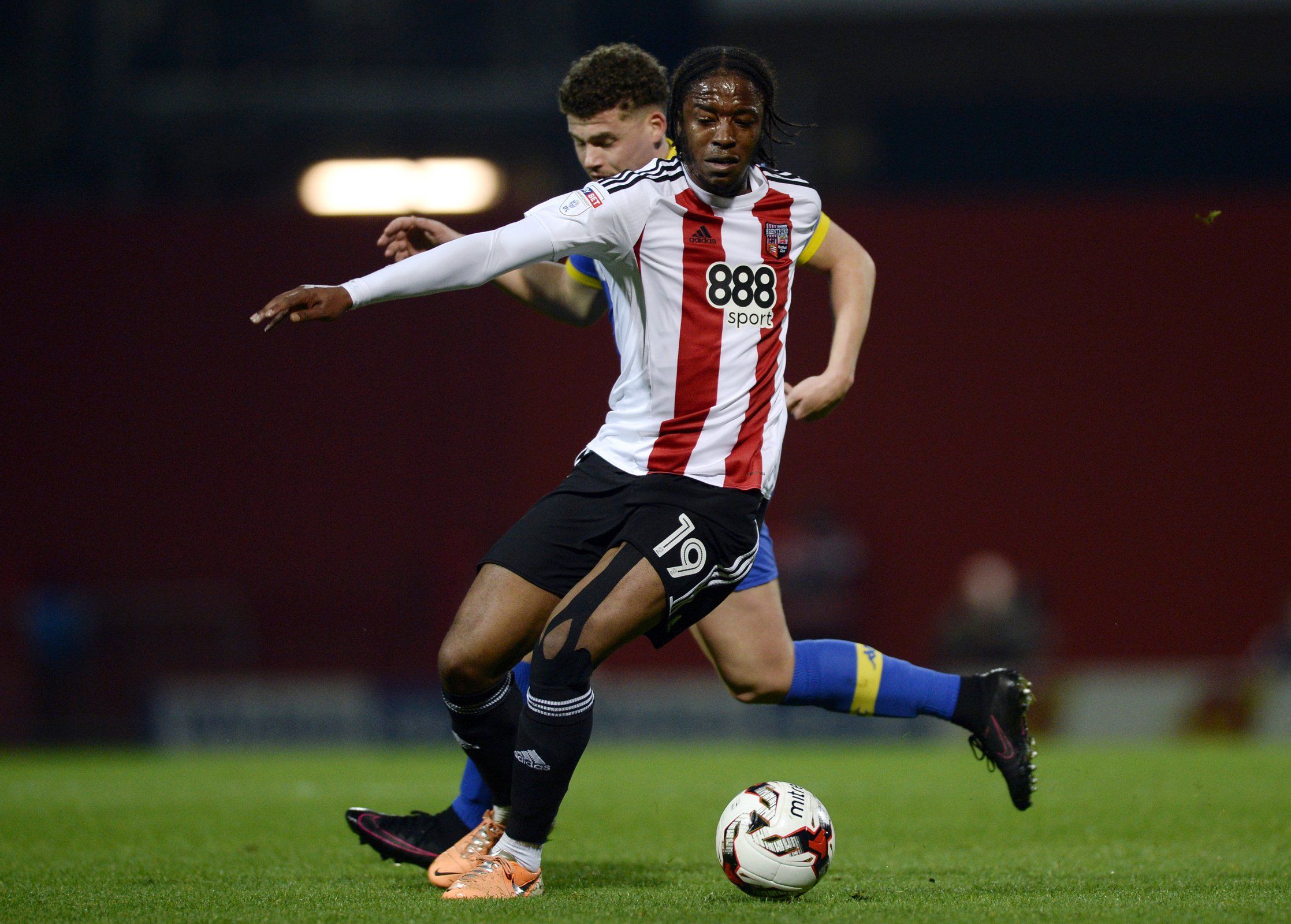 Romaine Sawyers in action for Brentford against Leeds United