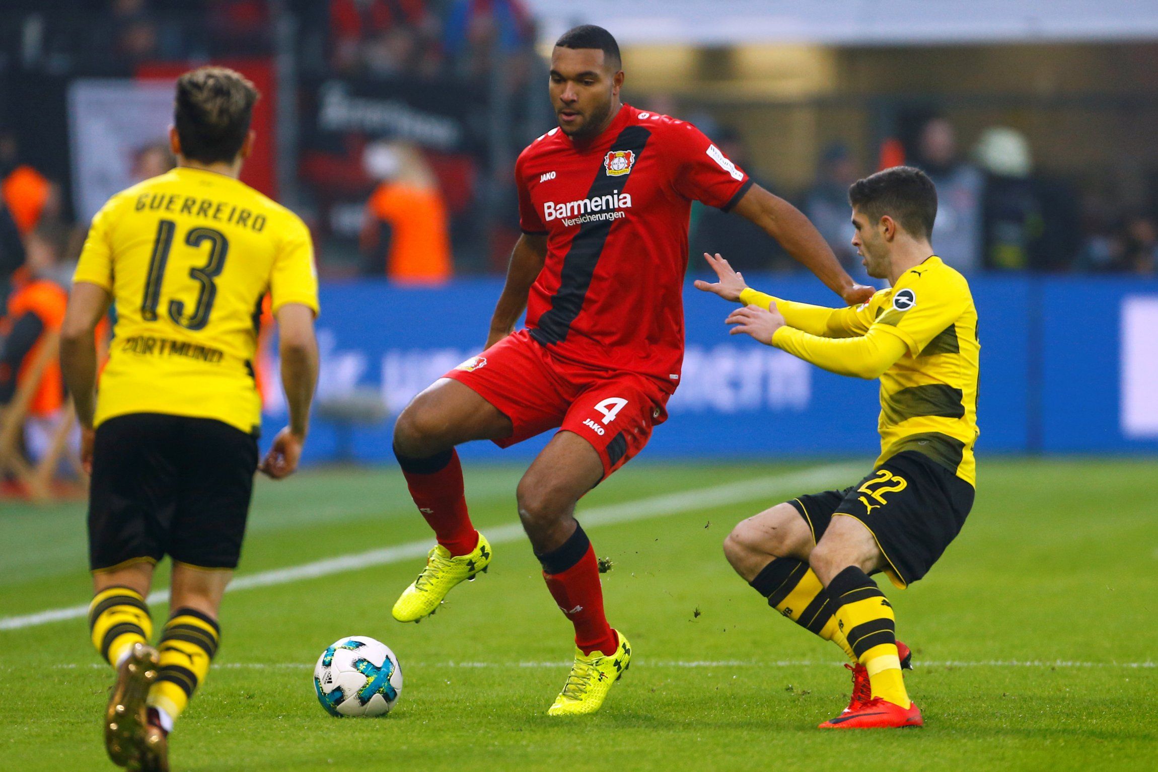 Jonathan Tah in action for Bayer Leverkusen against Borussia Dortmund