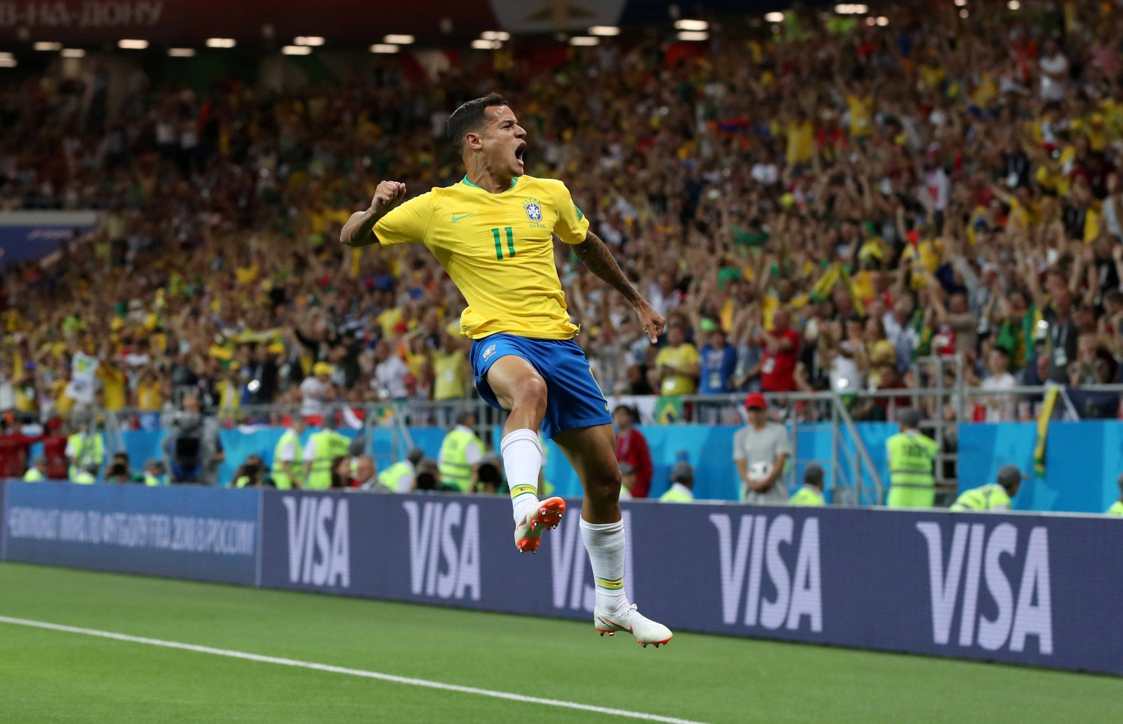 Philippe Coutinho celebrates scoring for Brazil against Switzerland