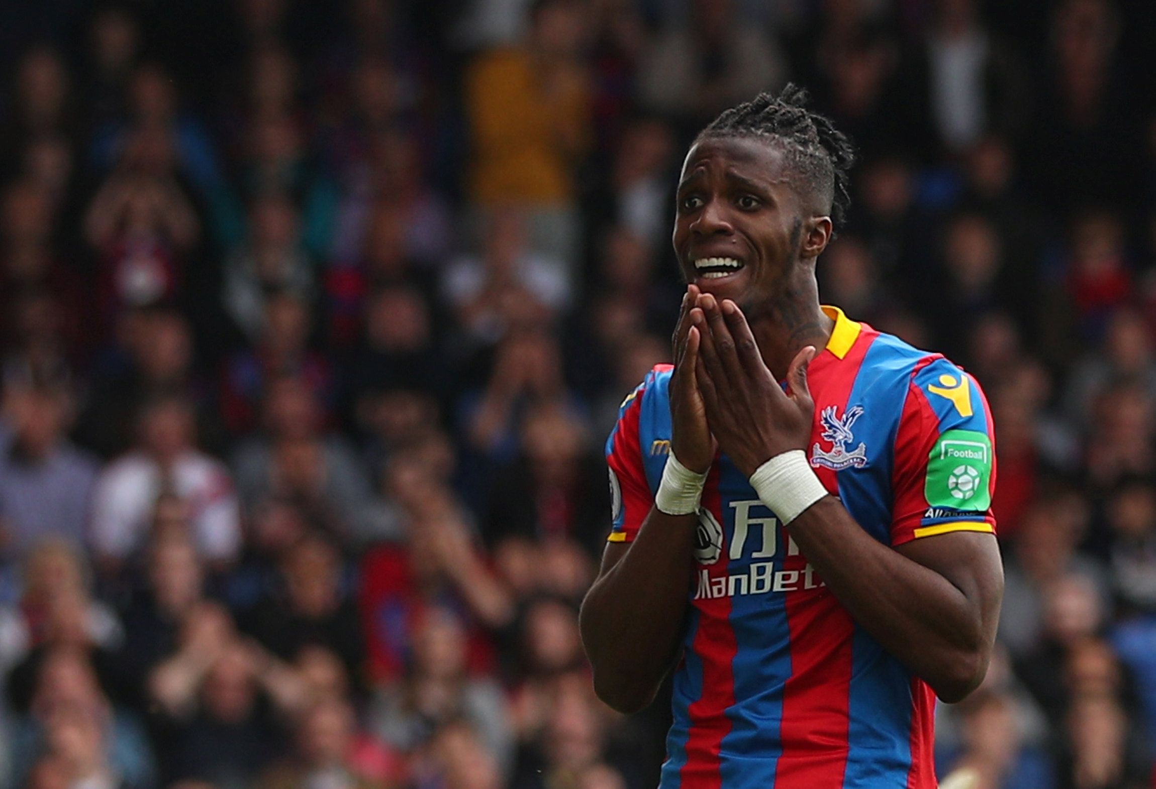 Soccer Football - Premier League - Crystal Palace vs West Bromwich Albion - Selhurst Park, London, Britain - May 13, 2018   Crystal Palace's Wilfried Zaha reacts after a missed chance   REUTERS/Hannah McKay    EDITORIAL USE ONLY. No use with unauthorized audio, video, data, fixture lists, club/league logos or 