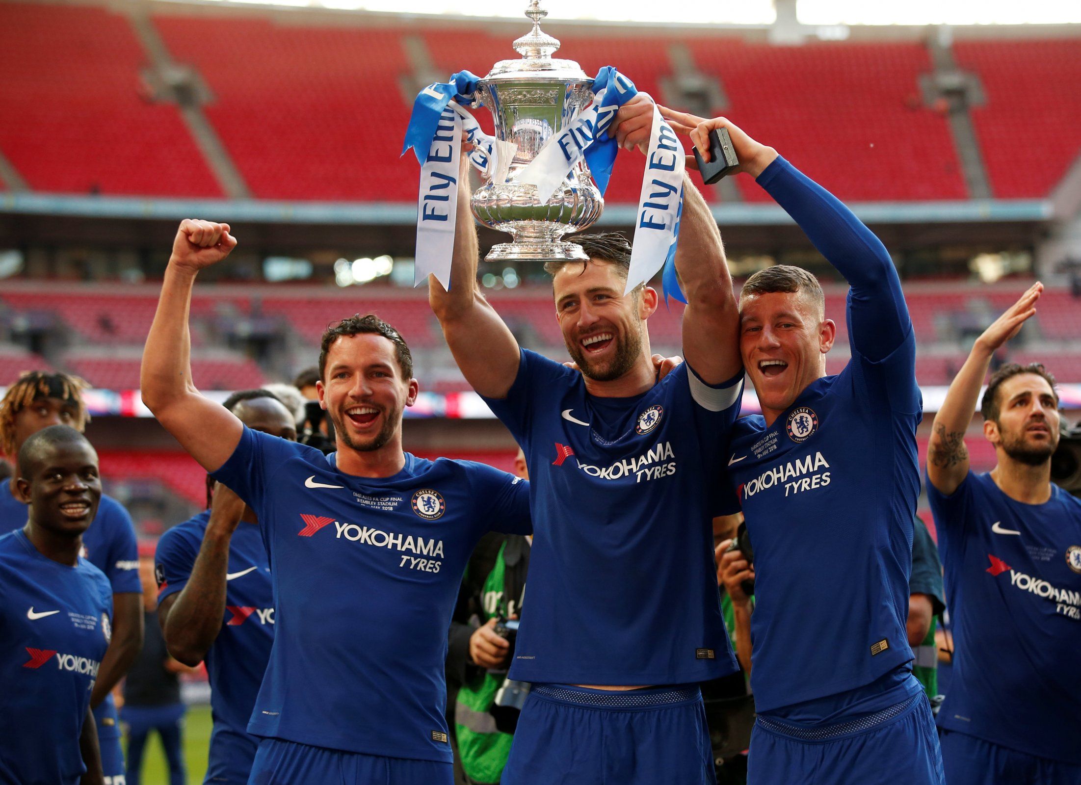 Danny Drinkwater, Gary Cahill and Ross Barkley lift the FA Cup