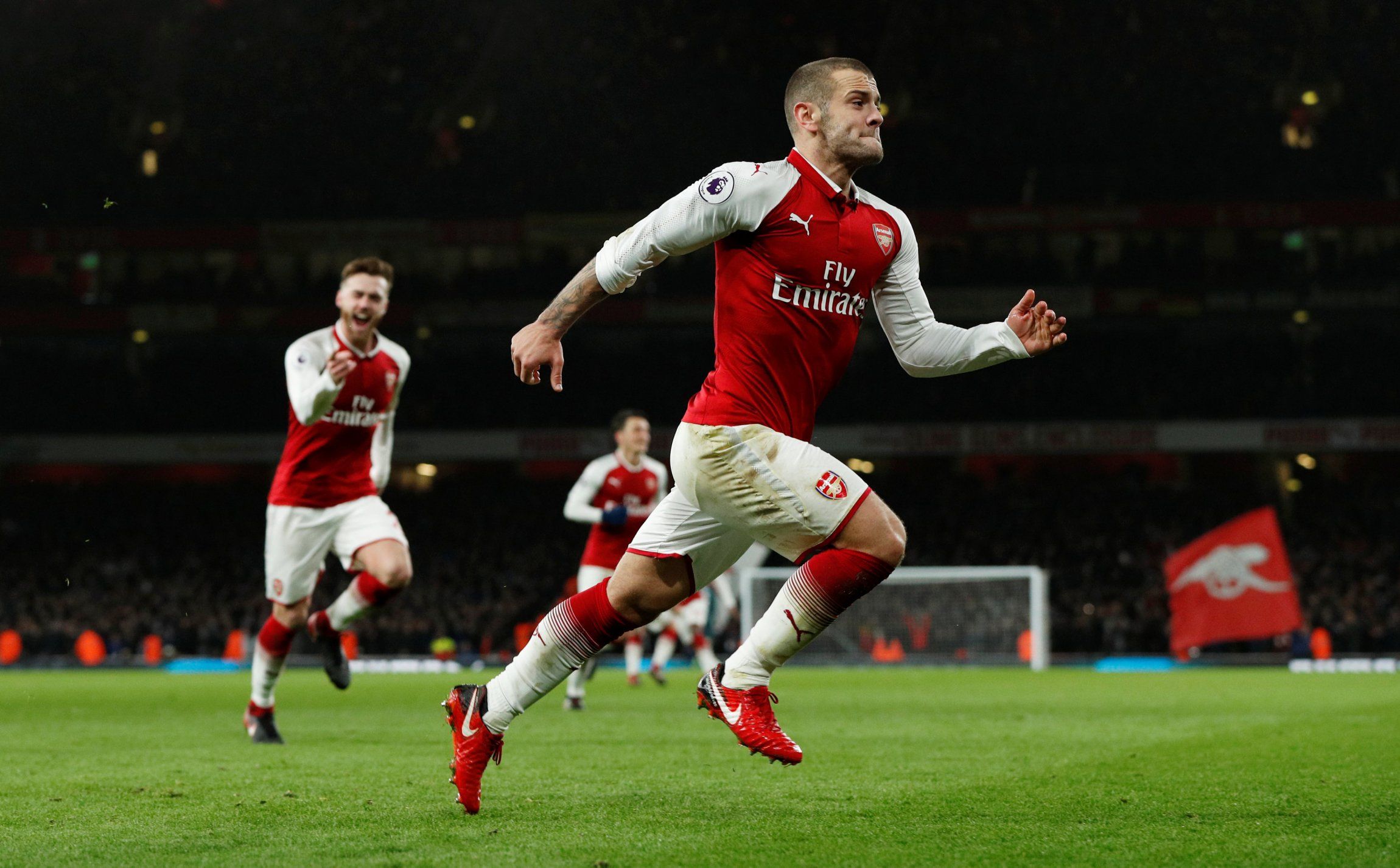 Jack Wilshere celebrates scoring for Arsenal