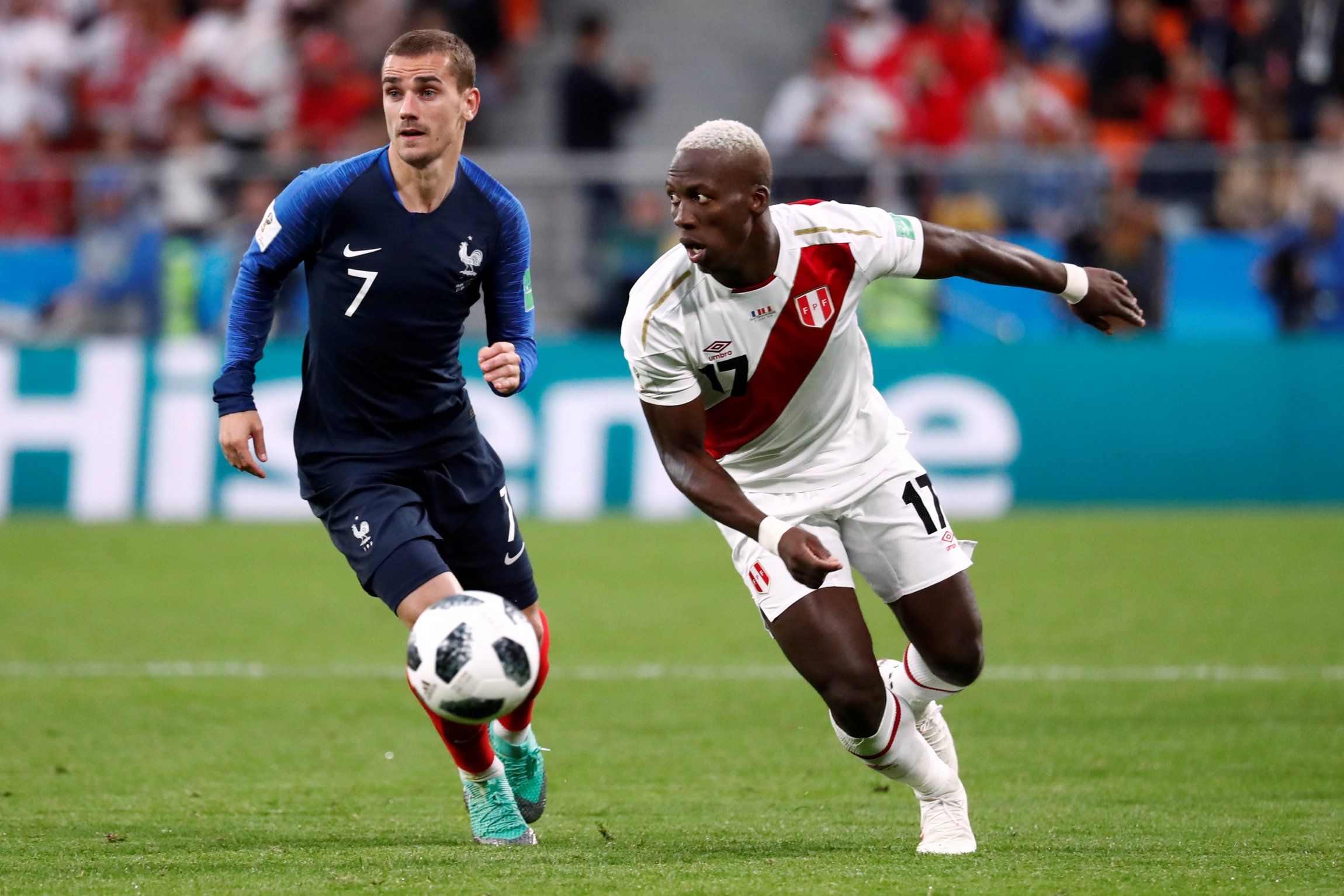 Luis Advincula in action with Antoine Griezmann