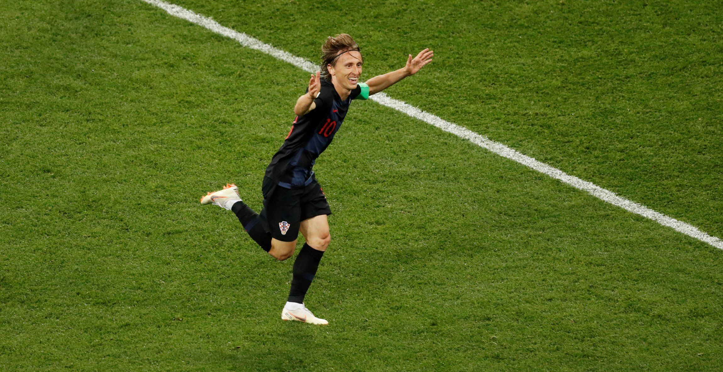 Luka Modric celebrates scoring for Croatia