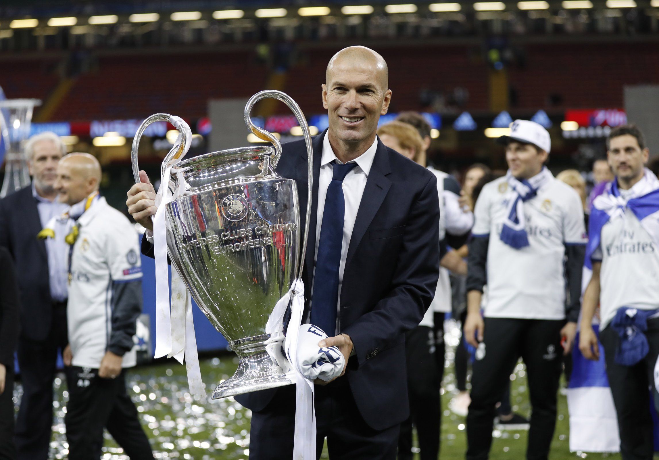 Zinedine Zidane poses with the Champions League trophy