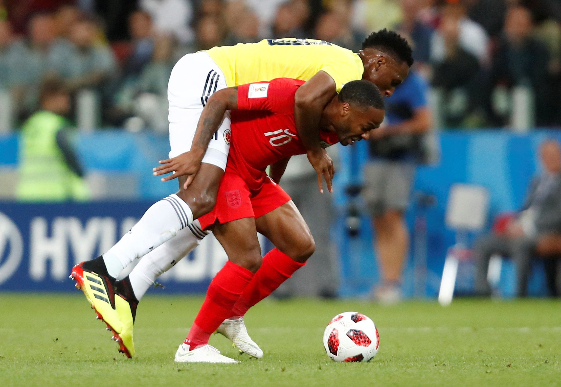 Soccer Football - World Cup - Round of 16 - Colombia vs England - Spartak Stadium, Moscow, Russia - July 3, 2018  England's Raheem Sterling in action with Colombia's Yerry Mina    REUTERS/Maxim Shemetov