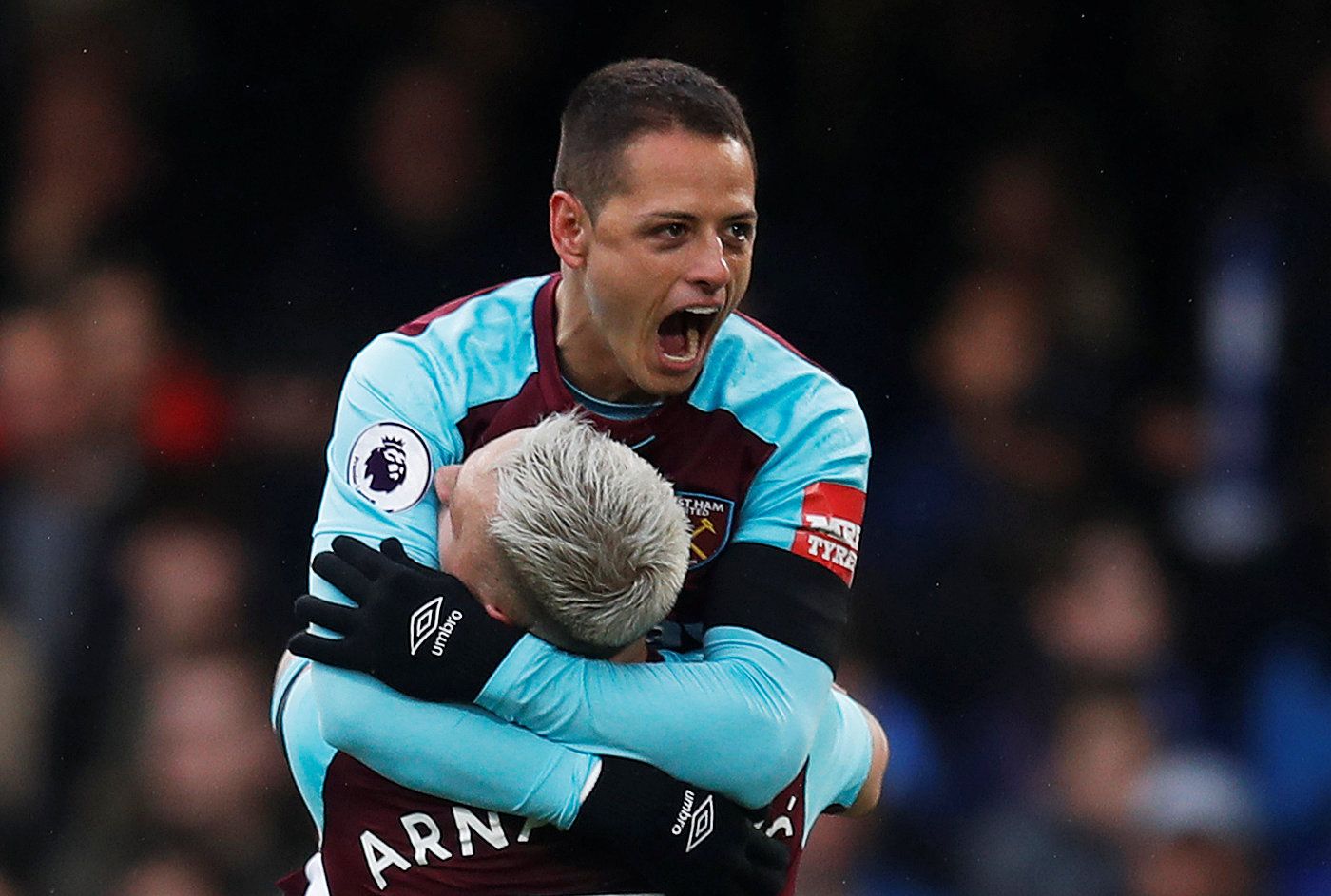 Soccer Football - Premier League - Chelsea vs West Ham United - Stamford Bridge, London, Britain - April 8, 2018   West Ham United's Javier Hernandez celebrates scoring their first goal with Marko Arnautovic   REUTERS/Eddie Keogh    EDITORIAL USE ONLY. No use with unauthorized audio, video, data, fixture lists, club/league logos or "live" services. Online in-match use limited to 75 images, no video emulation. No use in betting, games or single club/league/player publications.  Please contact you