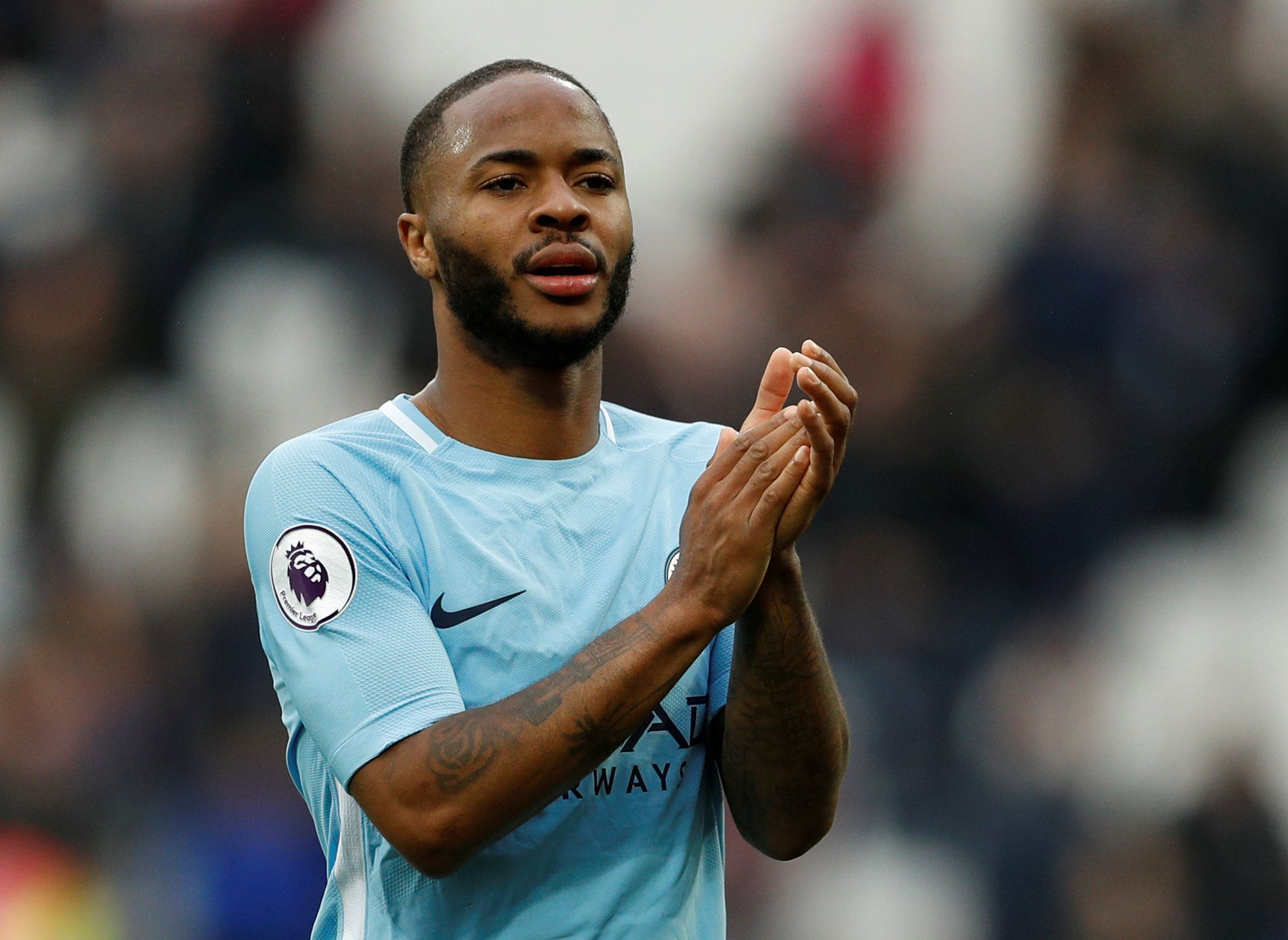 Soccer Football - Premier League - West Ham United v Manchester City - London Stadium, London, Britain - April 29, 2018   Manchester City's Raheem Sterling applauds the fans after the match   Action Images via Reuters/John Sibley    EDITORIAL USE ONLY. No use with unauthorized audio, video, data, fixture lists, club/league logos or "live" services. Online in-match use limited to 75 images, no video emulation. No use in betting, games or single club/league/player publications.  Please contact you