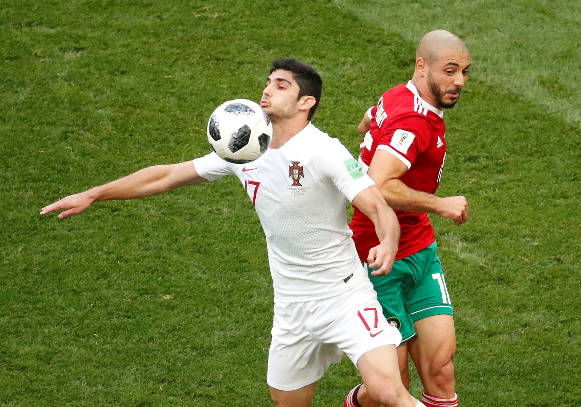 Soccer Football - World Cup - Group B - Portugal vs Morocco - Luzhniki Stadium, Moscow, Russia - June 20, 2018   Portugal's Goncalo Guedes in action with Morocco's Nordin Amrabat     REUTERS/Christian Hartmann