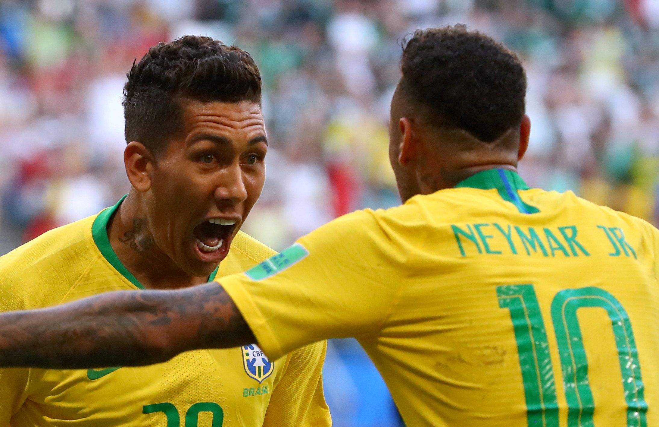 Soccer Football - World Cup - Round of 16 - Brazil vs Mexico - Samara Arena, Samara, Russia - July 2, 2018  Brazil's Roberto Firmino celebrates scoring their second goal with Neymar                    REUTERS/Michael Dalder     TPX IMAGES OF THE DAY