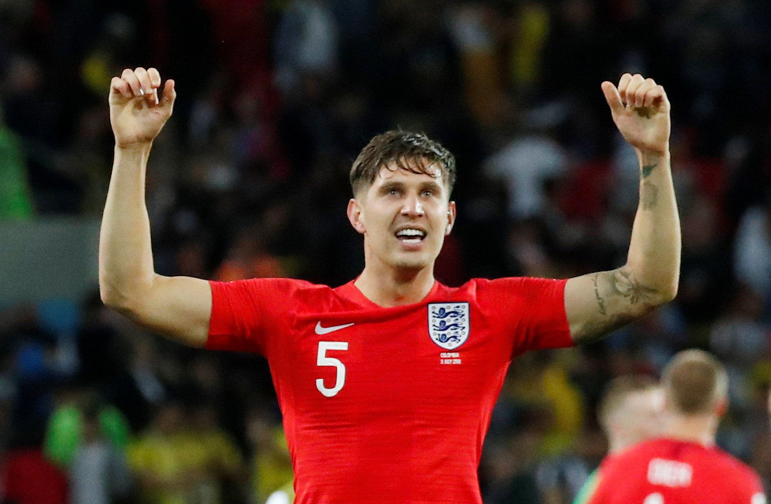 Soccer Football - World Cup - Round of 16 - Colombia vs England - Spartak Stadium, Moscow, Russia - July 3, 2018  England's John Stones celebrates winning the penalty shootout    REUTERS/Maxim Shemetov