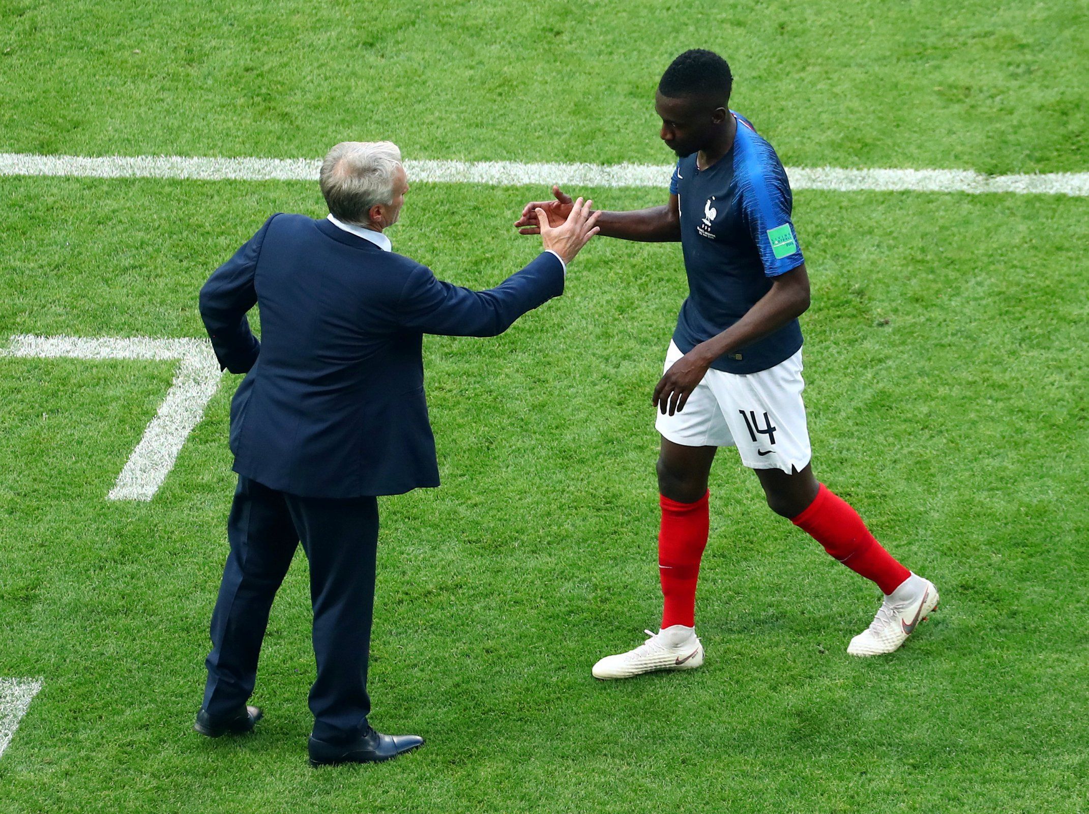Didier Deschamps shakes hands with Blaise Matuidi