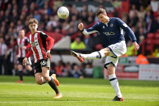 Soccer Football - Championship - Sheffield United vs Millwall - Bramall Lane, Sheffield, Britain - April 14, 2018   Millwall's Jake Cooper in action with Sheffield United's David Brooks   Action Images/Paul Burrows    EDITORIAL USE ONLY. No use with unauthorized audio, video, data, fixture lists, club/league logos or 