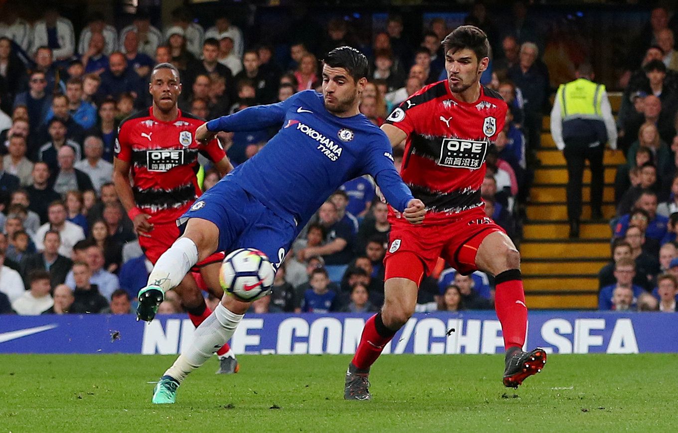Soccer Football - Premier League - Chelsea v Huddersfield Town - Stamford Bridge, London, Britain - May 9, 2018   Chelsea's Alvaro Morata in action with Huddersfield Town's Christopher Schindler    REUTERS/Hannah McKay    EDITORIAL USE ONLY. No use with unauthorized audio, video, data, fixture lists, club/league logos or 