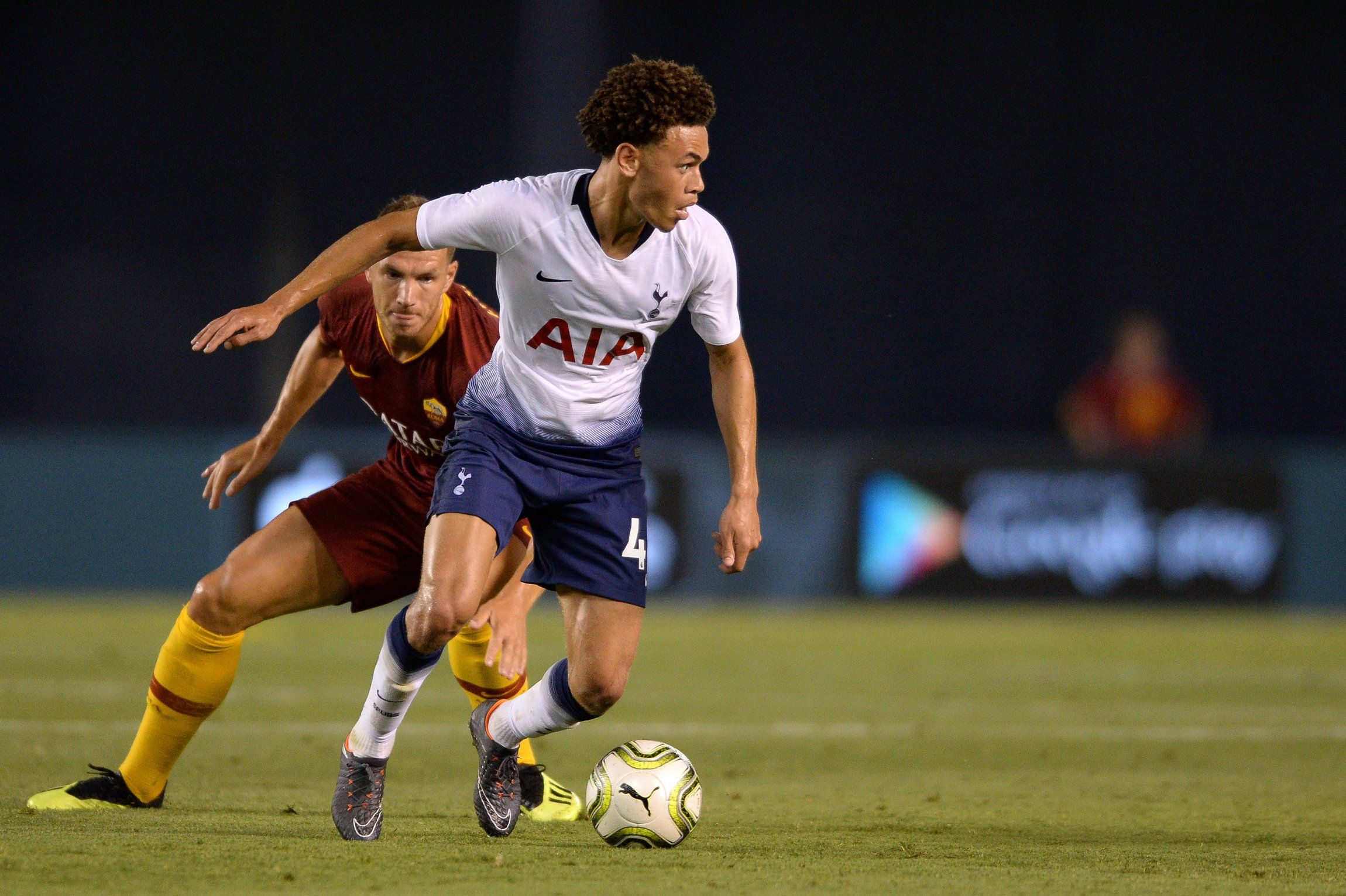 Tottenham's Luke Amos in action against Roma