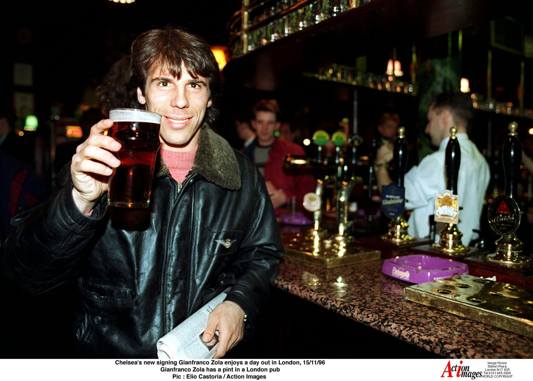 Gianfranco Zola enjoys a pint after signing for Chelsea