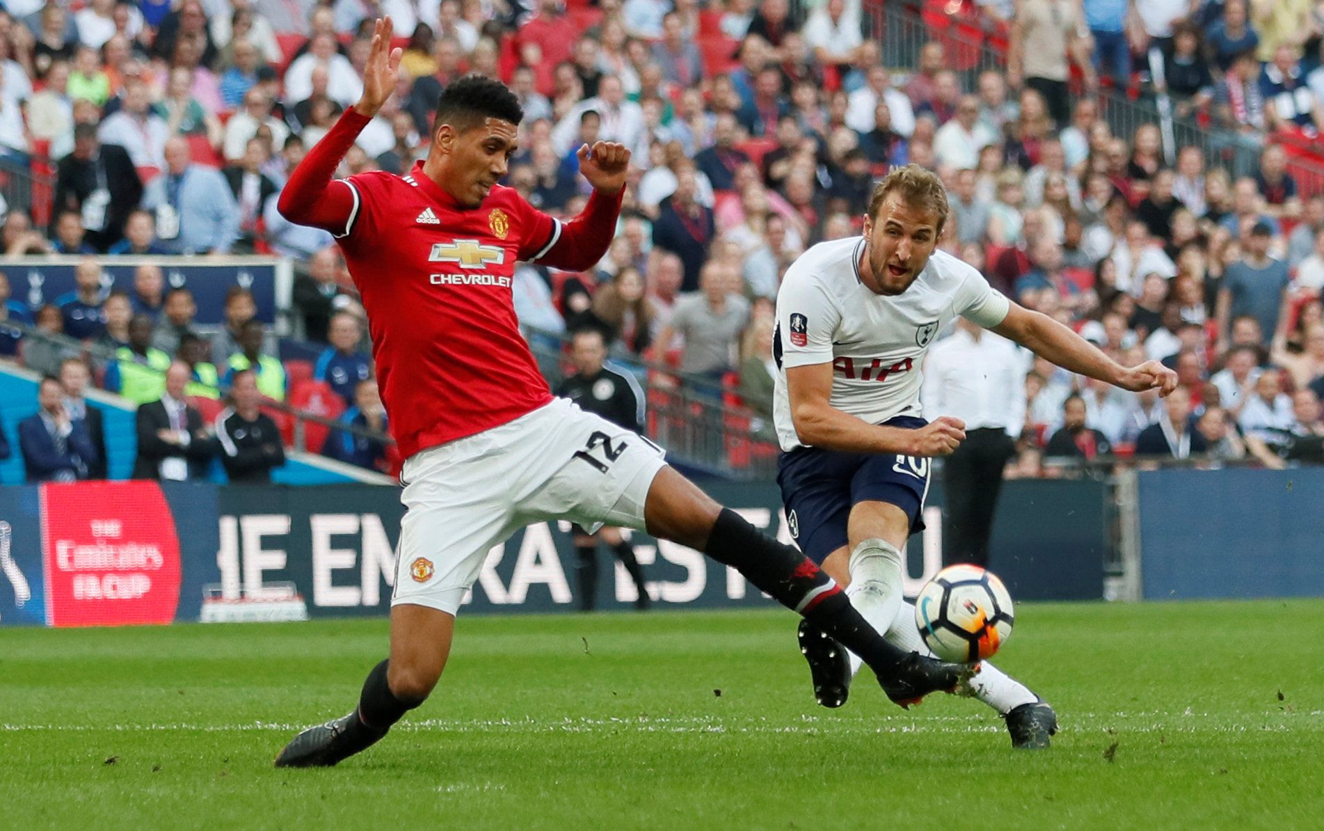 Soccer Football -  FA Cup Semi-Final - Manchester United v Tottenham Hotspur  - Wembley Stadium, London, Britain - April 21, 2018   Tottenham's Harry Kane in action with Manchester United's Chris Smalling   REUTERS/David Klein