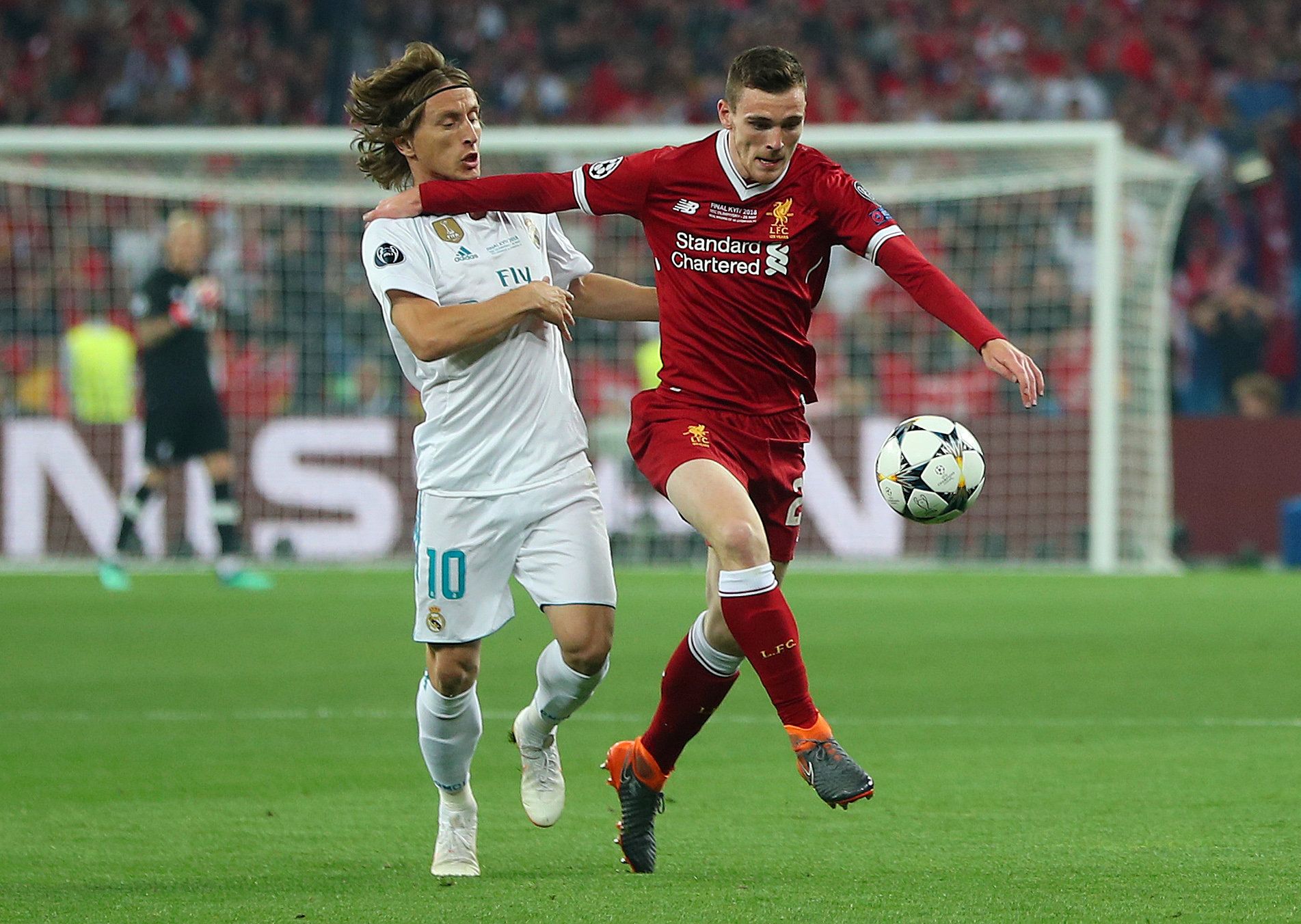 Soccer Football - Champions League Final - Real Madrid v Liverpool - NSC Olympic Stadium, Kiev, Ukraine - May 26, 2018   Liverpool's Andrew Robertson in action with Real Madrid's Luka Modric    REUTERS/Hannah McKay
