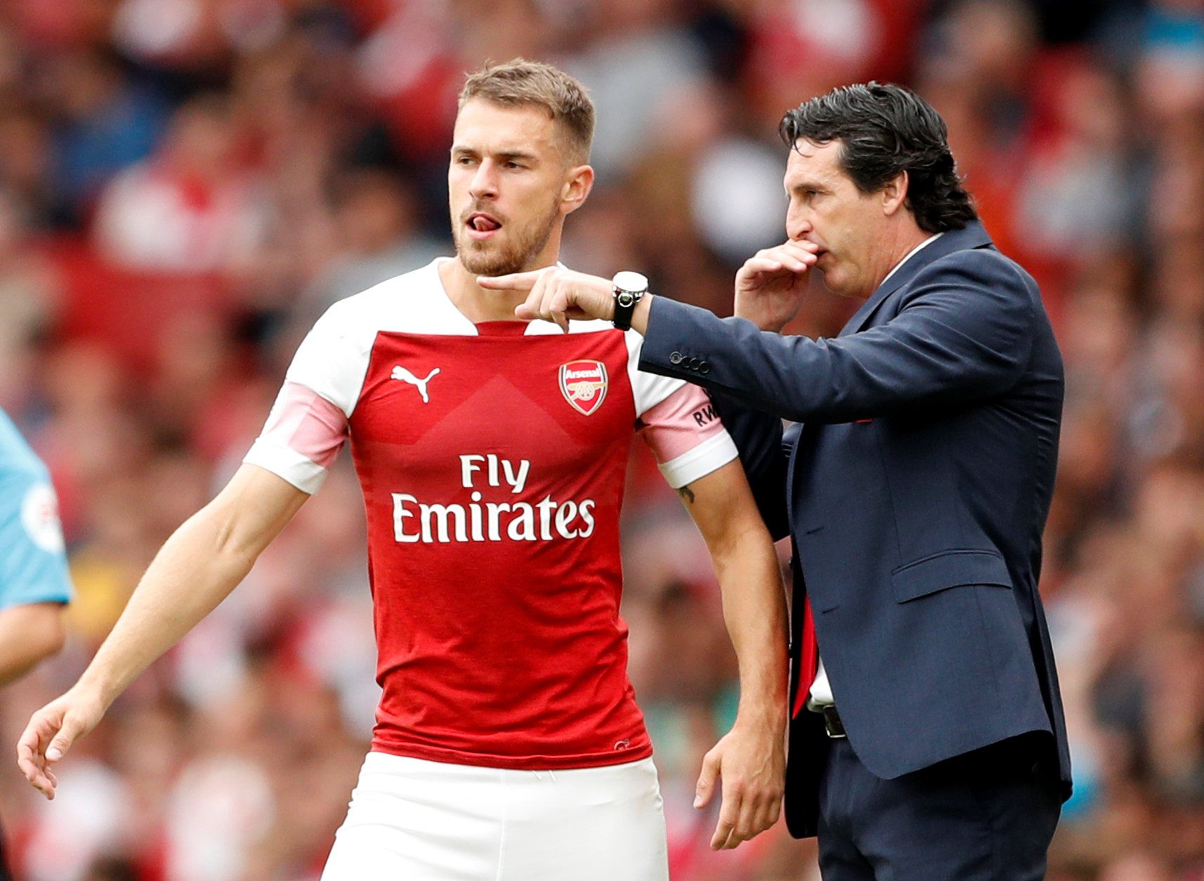 Soccer Football - Premier League - Arsenal v Manchester City - Emirates Stadium, London, Britain - August 12, 2018   Arsenal manager Unai Emery and Arsenal's Aaron Ramsey   Action Images via Reuters/John Sibley    EDITORIAL USE ONLY. No use with unauthorized audio, video, data, fixture lists, club/league logos or 