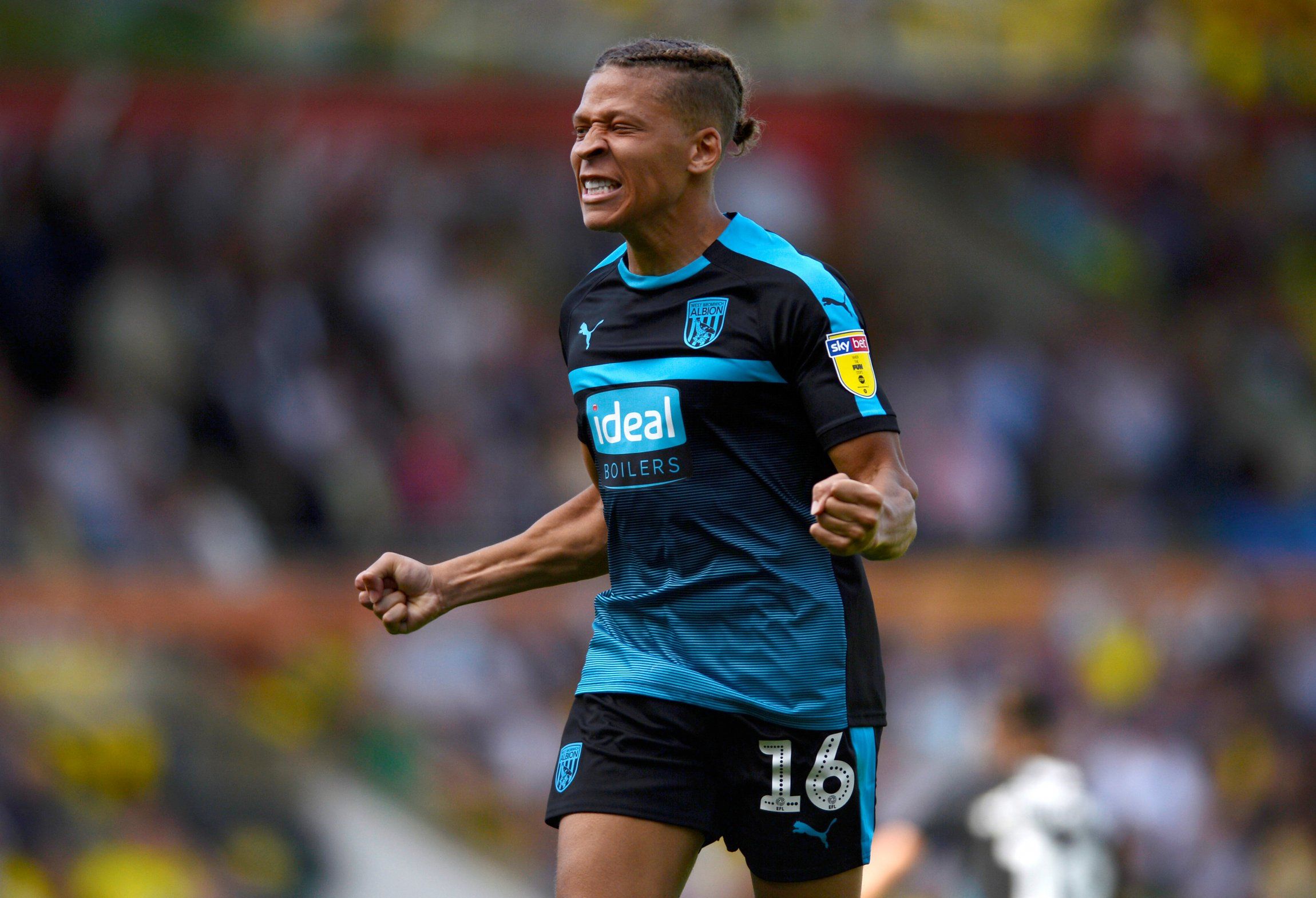 Dwight Gayle celebrates during West Bromwich Albion v Queens Park Rangers