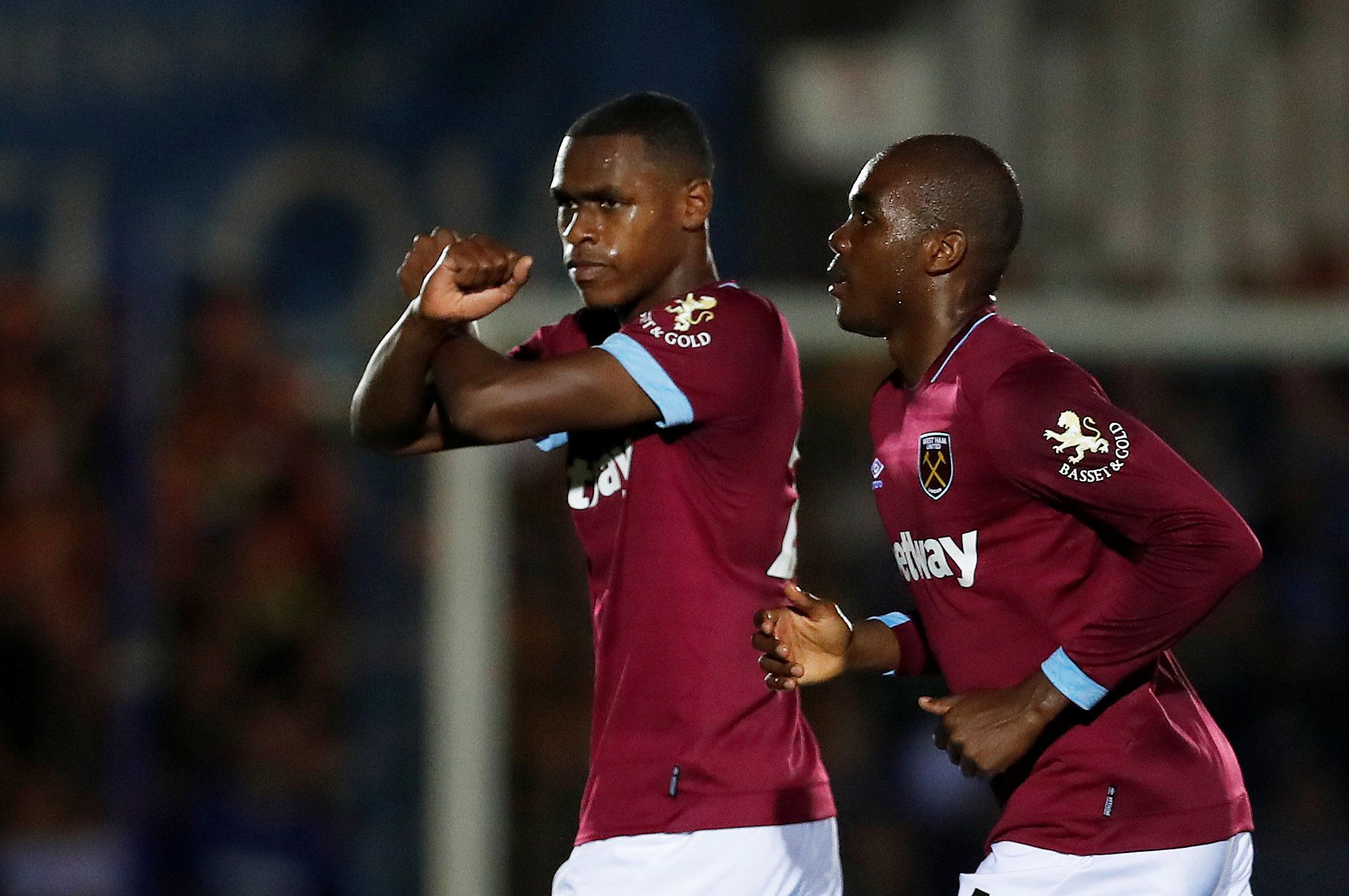 Issa Diop and Angelo Ogbonna celebrate scoring against Wimbledon