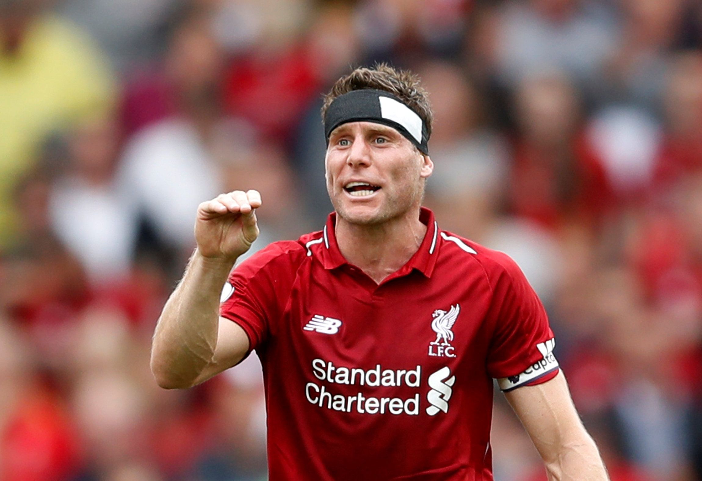 Soccer Football - Premier League - Liverpool v West Ham United - Anfield, Liverpool, Britain - August 12, 2018   Liverpool's James Milner gestures during the match    Action Images via Reuters/Carl Recine    EDITORIAL USE ONLY. No use with unauthorized audio, video, data, fixture lists, club/league logos or 