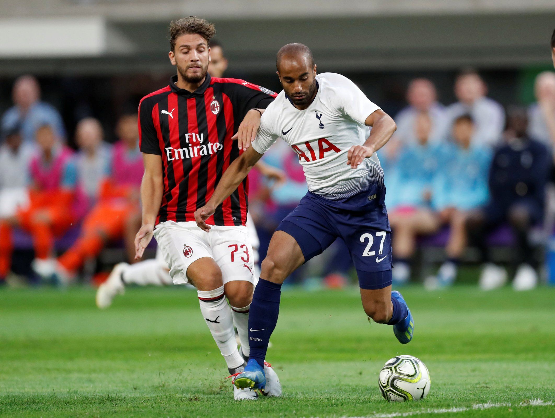 Lucas Moura in action against AC Milan