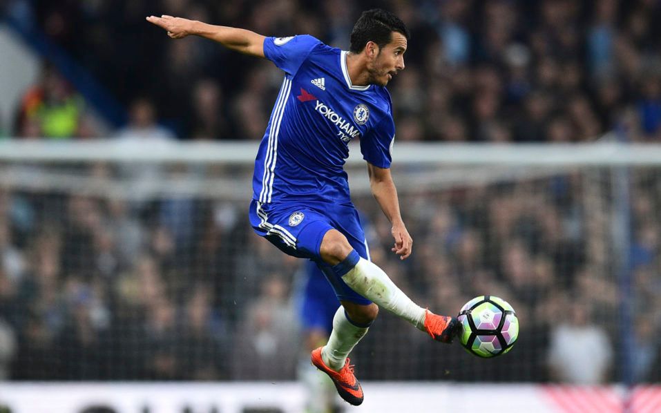 Chelsea's Spanish midfielder Pedro controls the ball during the English Premier League football match between Chelsea and Manchester United at Stamford Bridge in London on October 23, 2016. / AFP PHOTO / GLYN KIRK / RESTRICTED TO EDITORIAL USE. No use with unauthorized audio, video, data, fixture lists, club/league logos or 'live' services. Online in-match use limited to 75 images, no video emulation. No use in betting, games or single club/league/player publications.  /