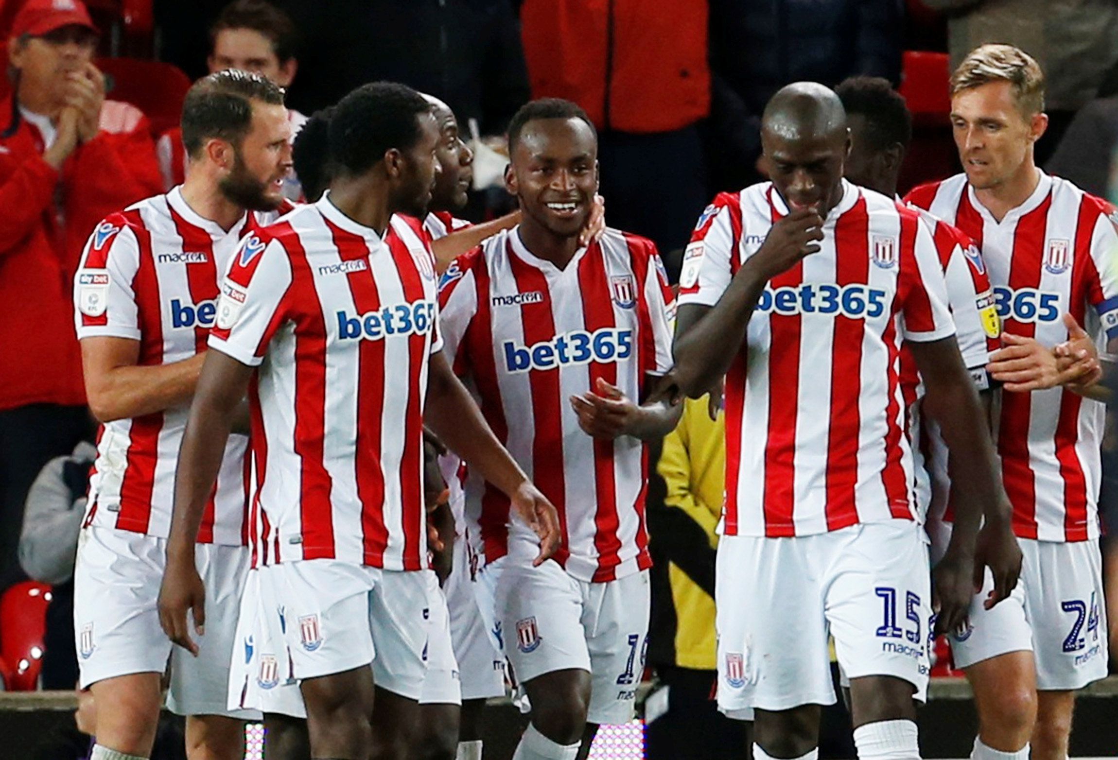 Soccer Football - Carabao Cup Second Round - Stoke City v Huddersfield Town - bet365 Stadium, Stoke-on-Trent, Britain - August 28, 2018  Stoke City's Saido Berahino celebrates scoring their first goal with team mates      Action Images via Reuters/Craig Brough  EDITORIAL USE ONLY. No use with unauthorized audio, video, data, fixture lists, club/league logos or 