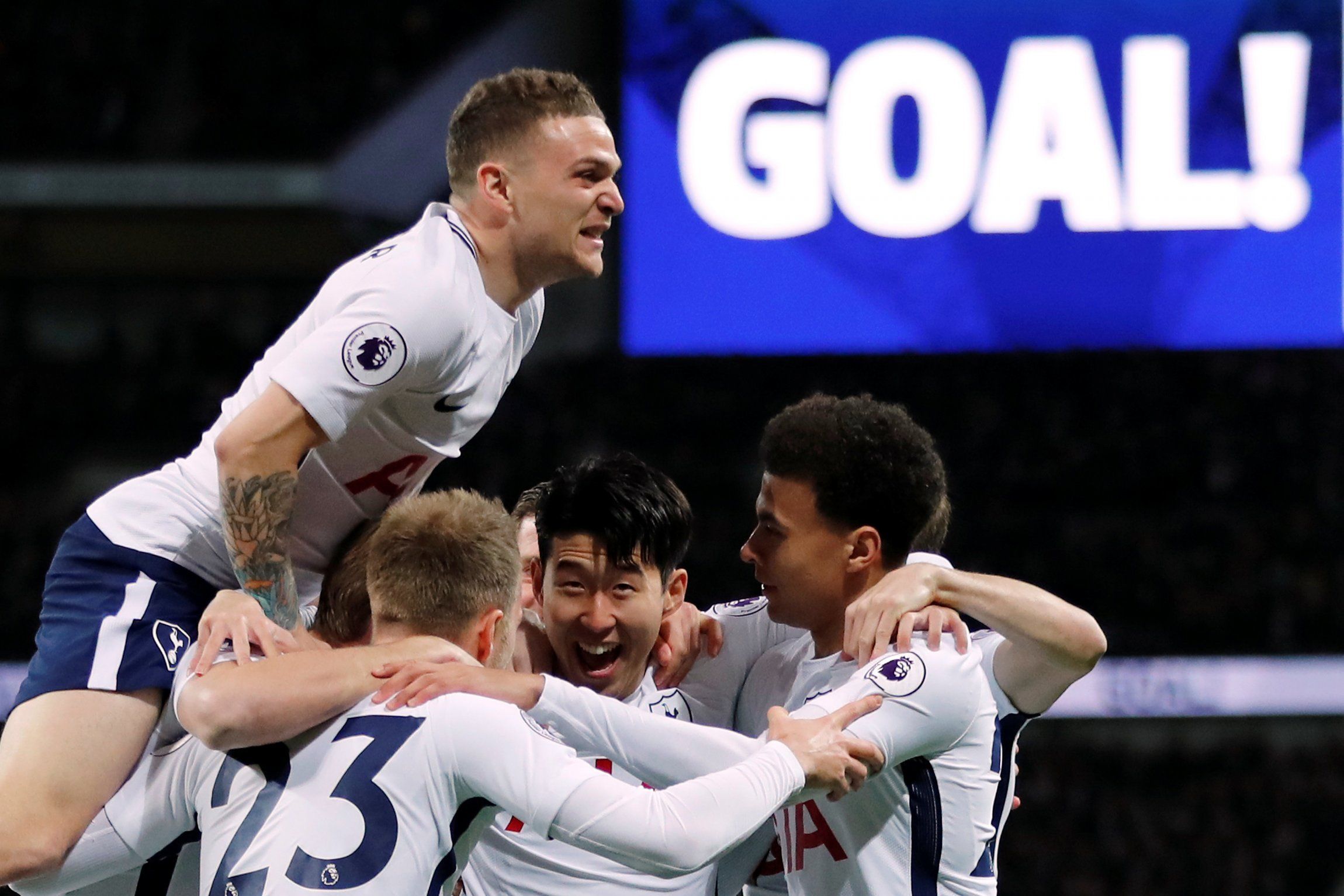 Tottenham celebrate scoring in the first minute against Manchester United