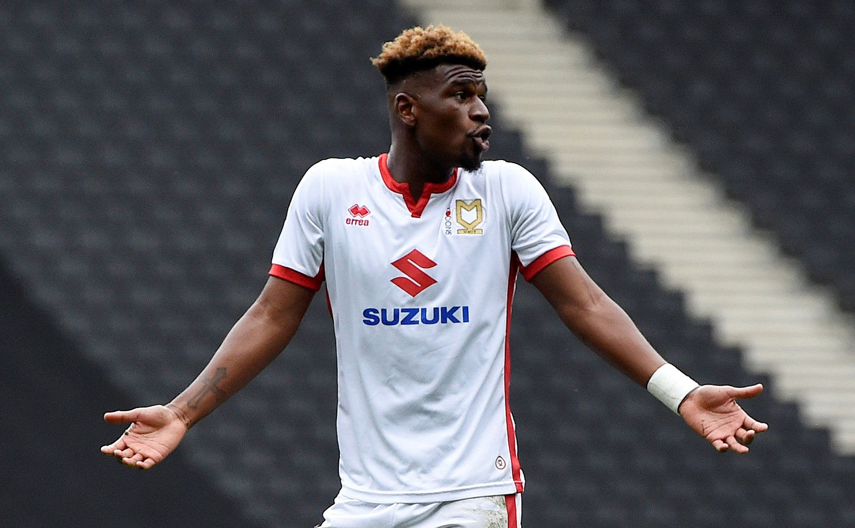 Soccer Football - League One - Milton Keynes Dons vs Bradford City - Stadium MK, Milton Keynes, Britain - October 7, 2017  MK Dons' Aaron Tshibola protests after being sent off   Action Images/Alan Walter EDITORIAL USE ONLY. No use with unauthorized audio, video, data, fixture lists, club/league logos or 