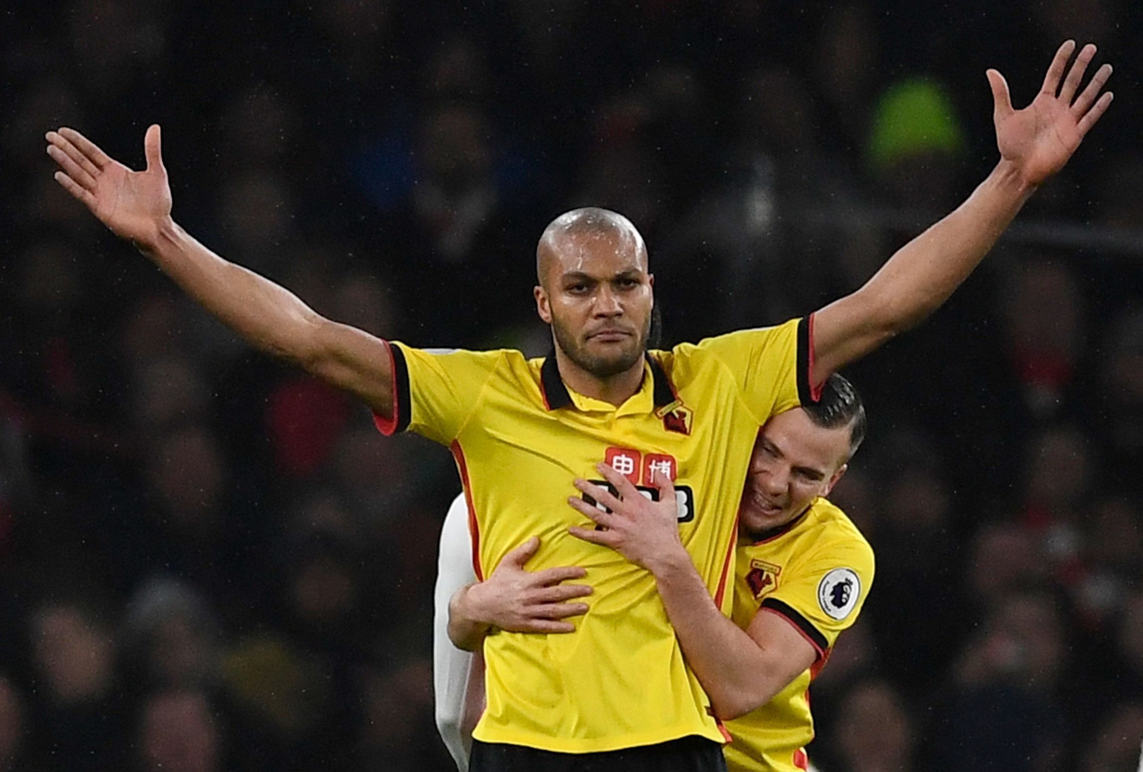 Britain Football Soccer - Arsenal v Watford - Premier League - Emirates Stadium - 31/1/17 Watford's Younes Kaboul celebrates scoring their first goal with Tom Cleverley  Reuters / Dylan Martinez Livepic EDITORIAL USE ONLY. No use with unauthorized audio, video, data, fixture lists, club/league logos or "live" services. Online in-match use limited to 45 images, no video emulation. No use in betting, games or single club/league/player publications.  Please contact your account representative for f