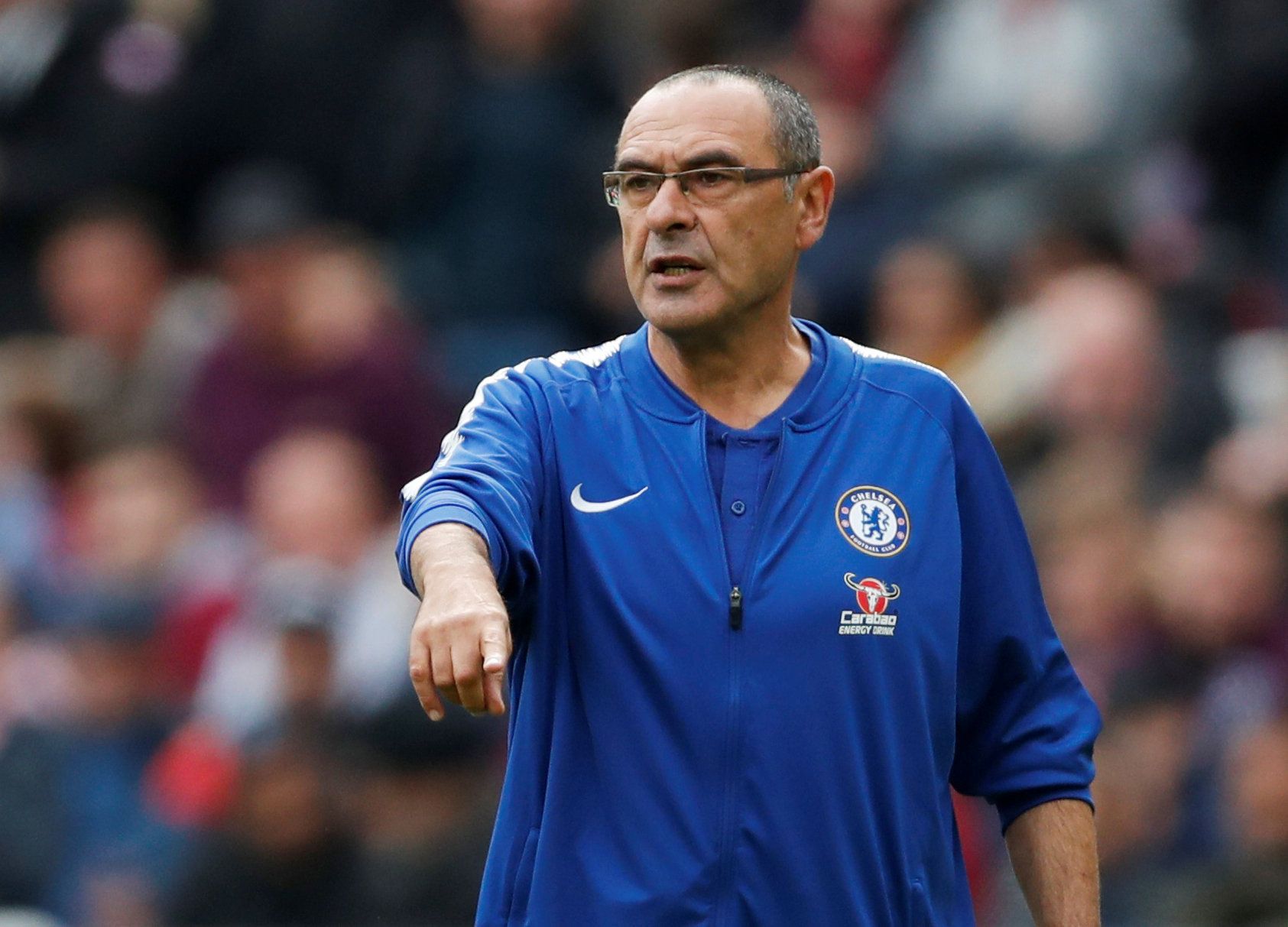 Soccer Football - Premier League - West Ham United v Chelsea - London Stadium, London, Britain - September 23, 2018  Chelsea manager Maurizio Sarri gestures during the match     Action Images via Reuters/Matthew Childs  EDITORIAL USE ONLY. No use with unauthorized audio, video, data, fixture lists, club/league logos or "live" services. Online in-match use limited to 75 images, no video emulation. No use in betting, games or single club/league/player publications.  Please contact your account rep