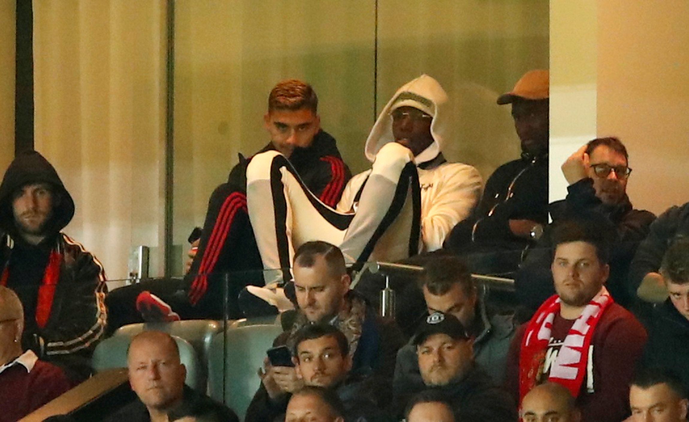 Soccer Football - Carabao Cup - Third Round - Manchester United v Derby County - Old Trafford, Manchester, Britain - September 25, 2018  Manchester United's Paul Pogba watches the match from the stands  Action Images via Reuters/Andrew Boyers  EDITORIAL USE ONLY. No use with unauthorized audio, video, data, fixture lists, club/league logos or 