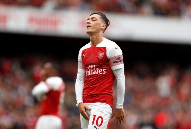 Soccer Football - Premier League - Arsenal v Manchester City - Emirates Stadium, London, Britain - August 12, 2018   Arsenal's Mesut Ozil reacts   Action Images via Reuters/John Sibley    EDITORIAL USE ONLY. No use with unauthorized audio, video, data, fixture lists, club/league logos or "live" services. Online in-match use limited to 75 images, no video emulation. No use in betting, games or single club/league/player publications.  Please contact your account representative for further details.