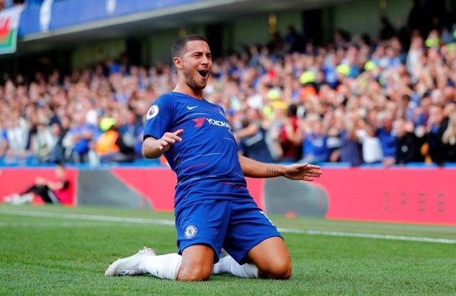 Soccer Football - Premier League - Chelsea v Cardiff City - Stamford Bridge, London, Britain - September 15, 2018  Chelsea's Eden Hazard celebrates scoring their first goal            REUTERS/Eddie Keogh  EDITORIAL USE ONLY. No use with unauthorized audio, video, data, fixture lists, club/league logos or "live" services. Online in-match use limited to 75 images, no video emulation. No use in betting, games or single club/league/player publications.  Please contact your account representative for