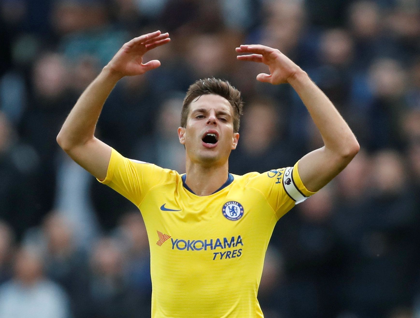 Cesar Azpilicueta throws his hands up in frustration during West Ham United v Chelsea