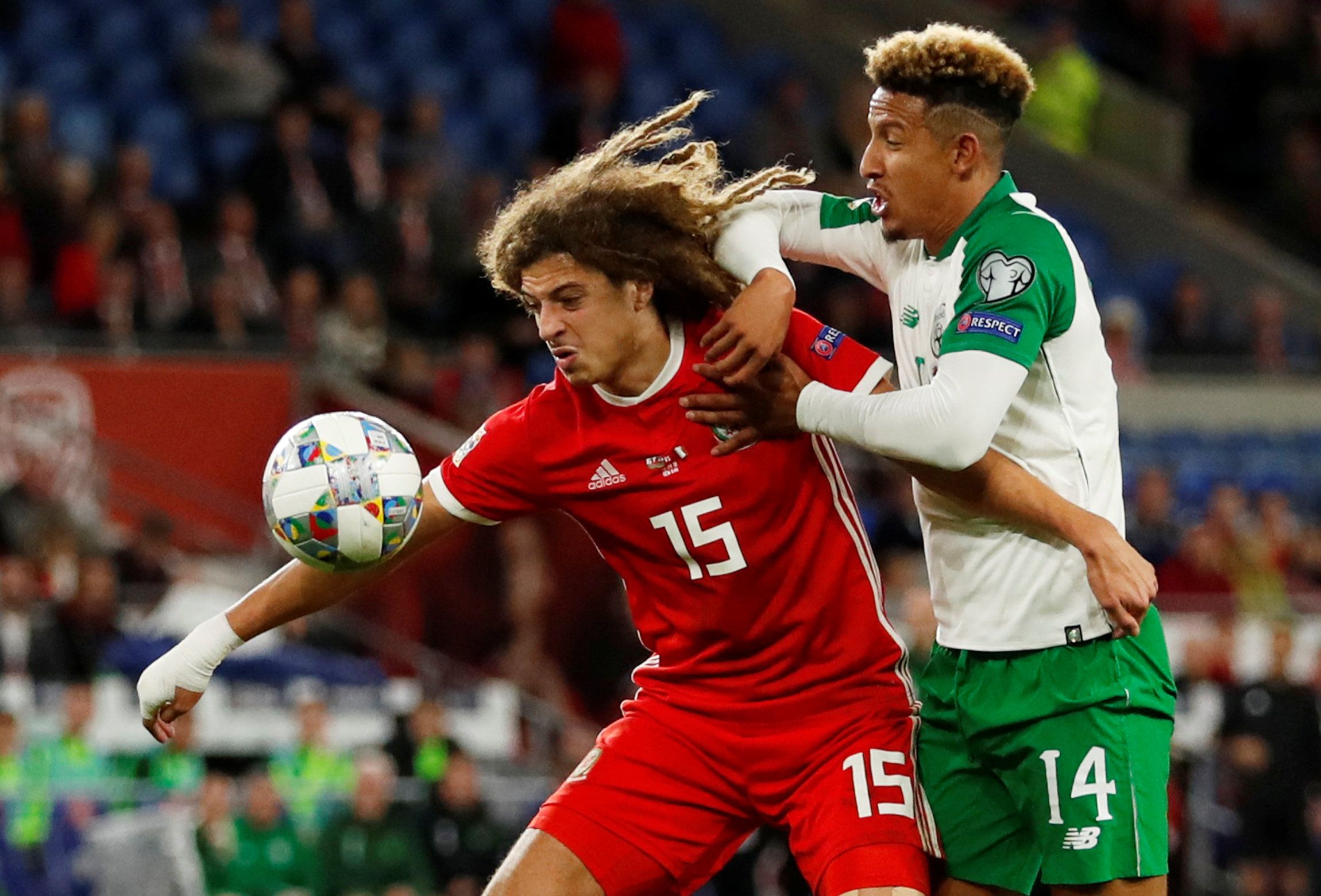 Soccer Football - UEFA Nations League - League B - Group 4 - Wales v Republic of Ireland - Cardiff City Stadium, Cardiff, Britain - September 6, 2018  Wales' Ethan Ampadu in action with Republic of Ireland's Callum Robinson     Action Images via Reuters/Andrew Boyers
