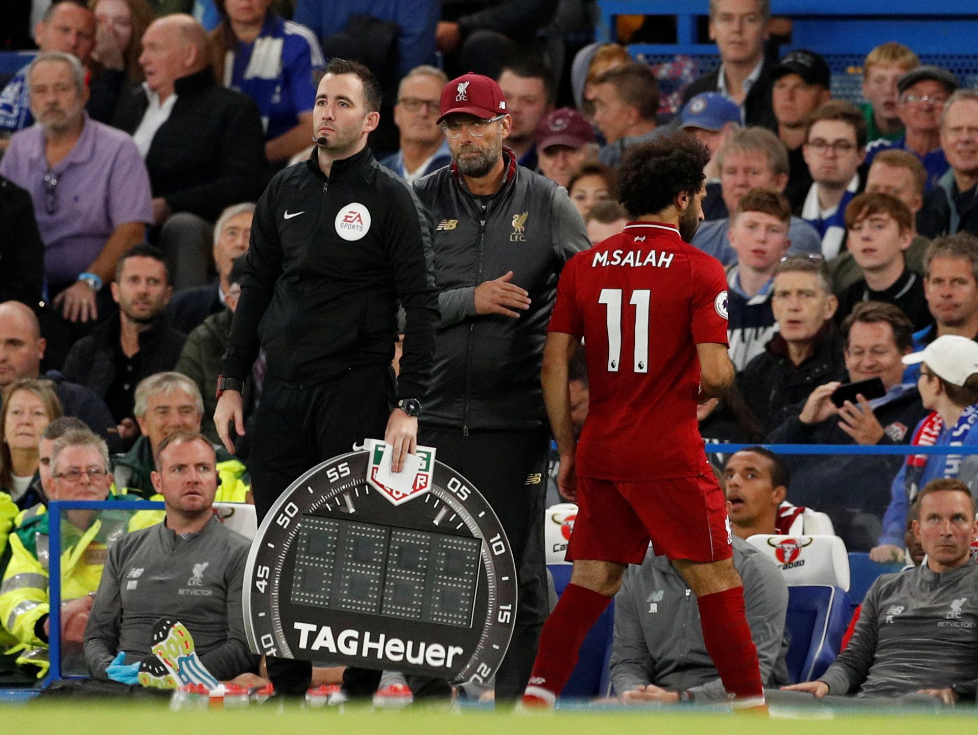 Mohamed Salah walks off the pitch after being substituted during Chelsea v Liverpool