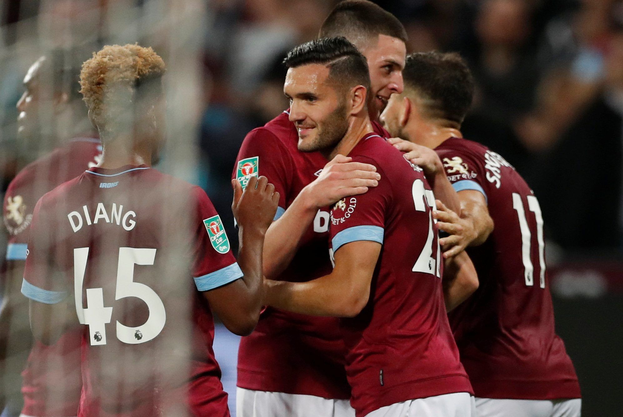 Soccer Football - Carabao Cup - Third Round - West Ham United v Macclesfield Town - London Stadium, London, Britain - September 26, 2018  West Ham's Lucas Perez celebrates scoring their third goal with team mates         Action Images via Reuters/Matthew Childs  EDITORIAL USE ONLY. No use with unauthorized audio, video, data, fixture lists, club/league logos or 