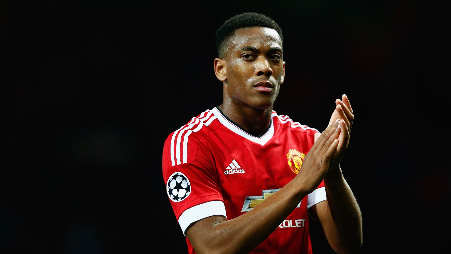 MANCHESTER, ENGLAND - SEPTEMBER 30:  Anthony Martial of Manchester United applauds the crowd after victory in the UEFA Champions League Group B match between Manchester United FC and VfL Wolfsburg at Old Trafford on September 30, 2015 in Manchester, United Kingdom.  (Photo by Dean Mouhtaropoulos/Getty Images)