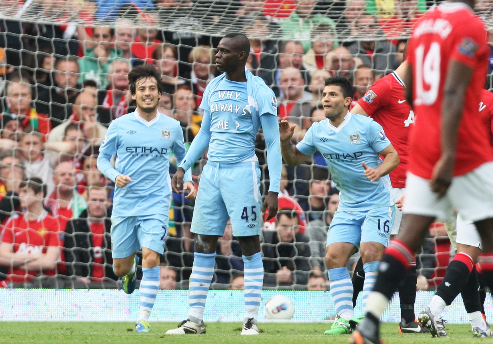 Mario Balotelli of Manchester City scores against Manchester united