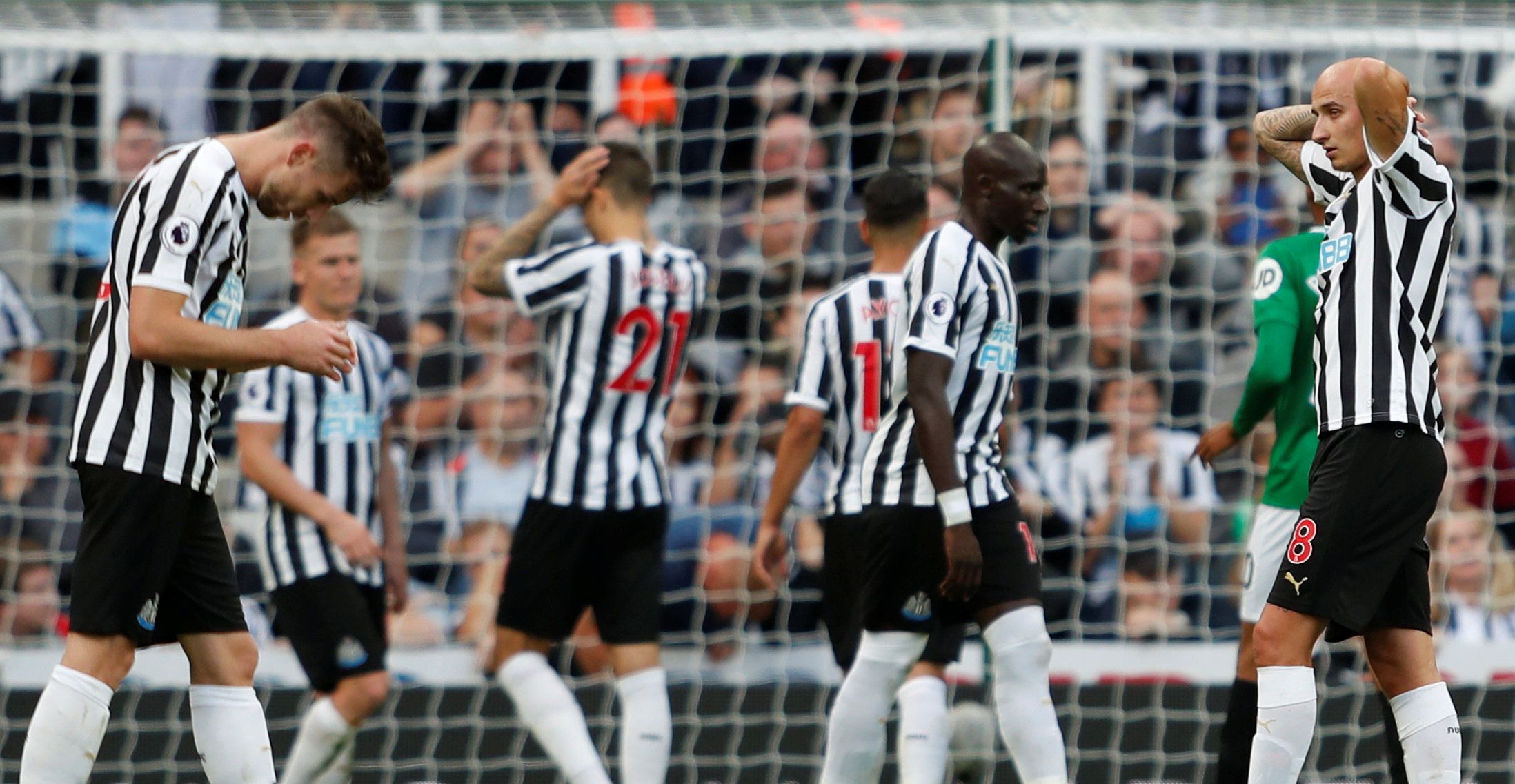 Soccer Football - Premier League - Newcastle United v Brighton &amp; Hove Albion - St James' Park, Newcastle, Britain - October 20, 2018  Newcastle United's Jonjo Shelvey and team mates react during the match             Action Images via Reuters/Lee Smith  EDITORIAL USE ONLY. No use with unauthorized audio, video, data, fixture lists, club/league logos or "live" services. Online in-match use limited to 75 images, no video emulation. No use in betting, games or single club/league/player publicat