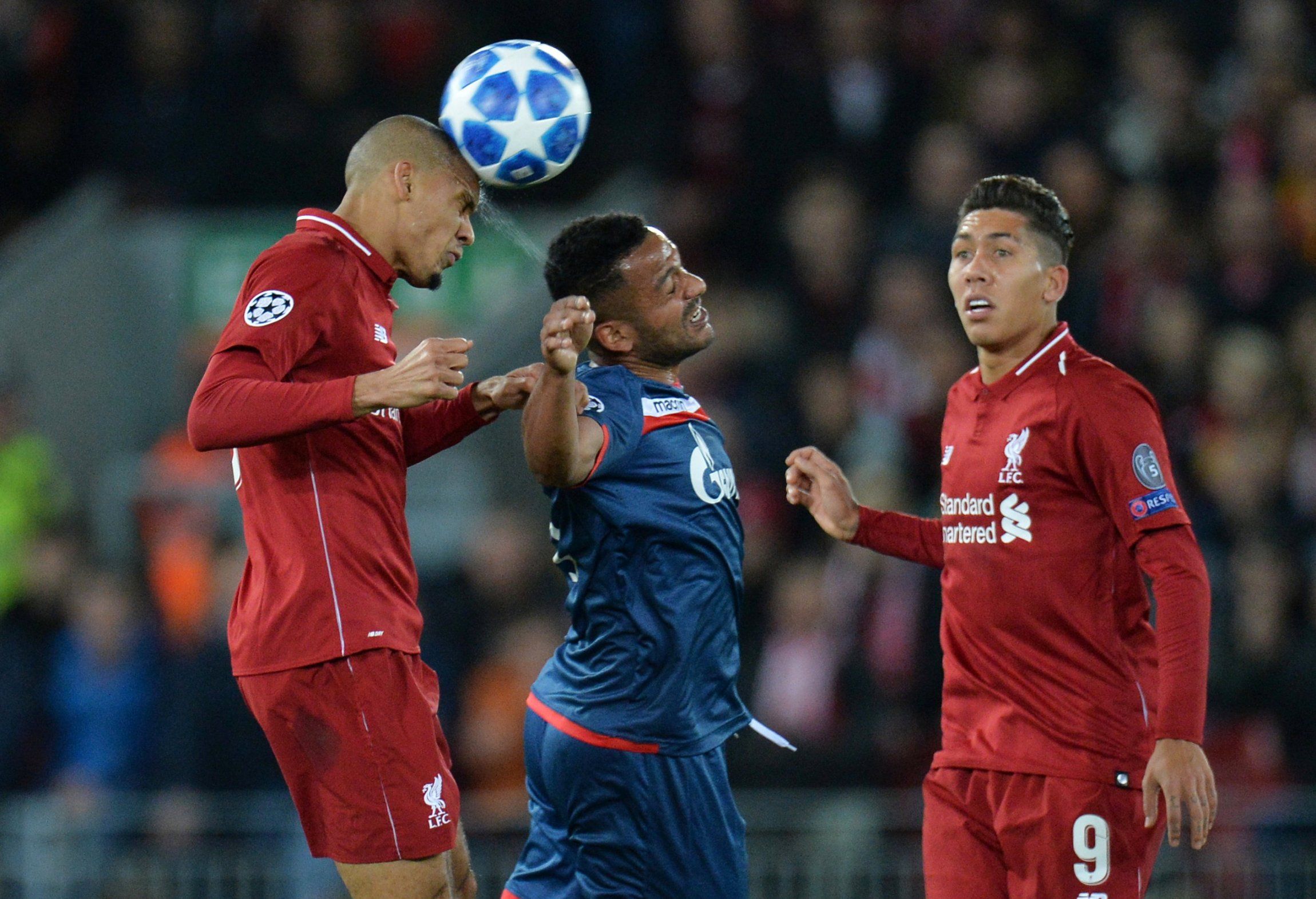 Fabinho heads the ball during Liverpool v Red Star Belgrade at Anfield