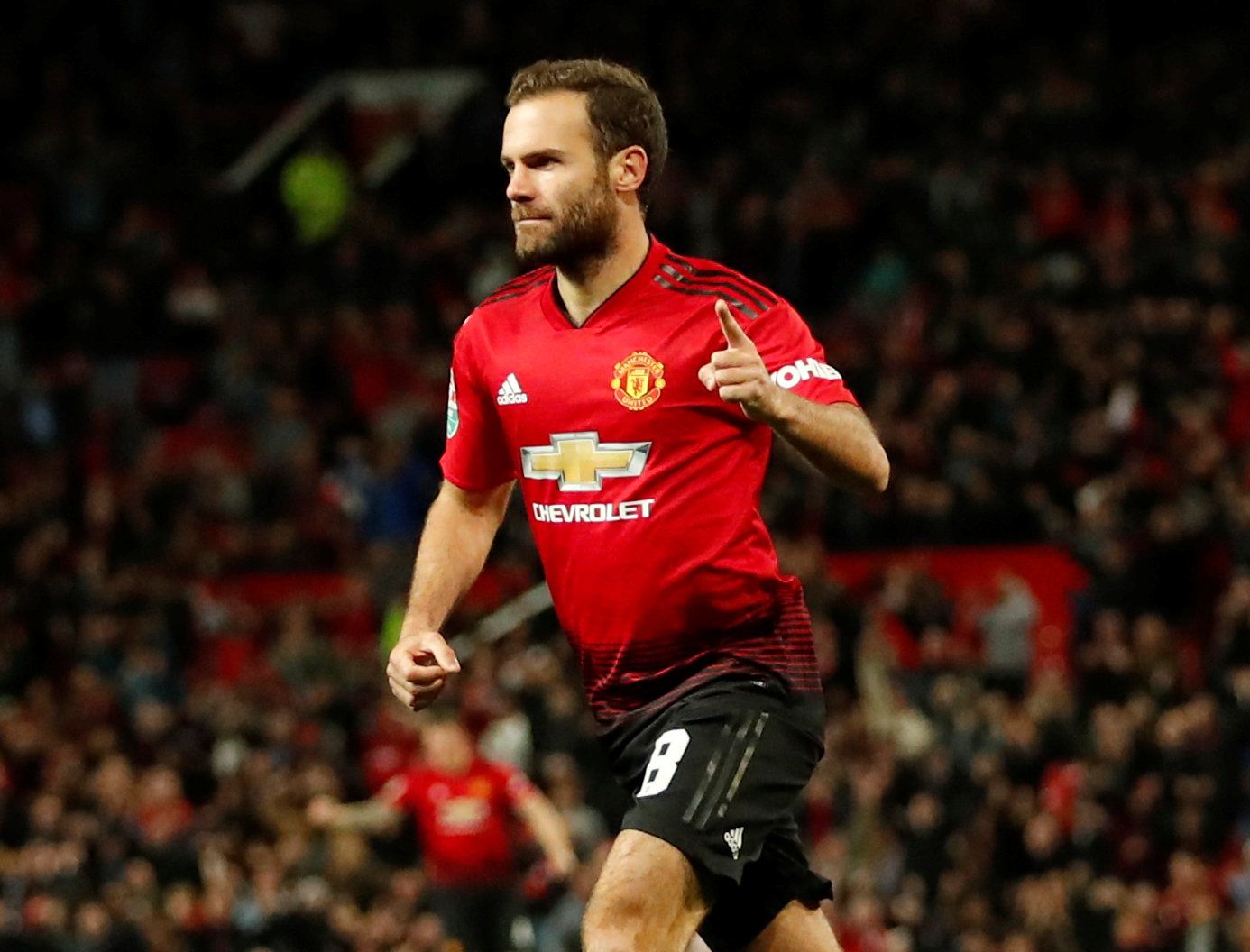 Soccer Football - Carabao Cup - Third Round - Manchester United v Derby County - Old Trafford, Manchester, Britain - September 25, 2018  Manchester United's Juan Mata celebrates scoring their first goal   Action Images via Reuters/Andrew Boyers  EDITORIAL USE ONLY. No use with unauthorized audio, video, data, fixture lists, club/league logos or "live" services. Online in-match use limited to 75 images, no video emulation. No use in betting, games or single club/league/player publications.  Pleas