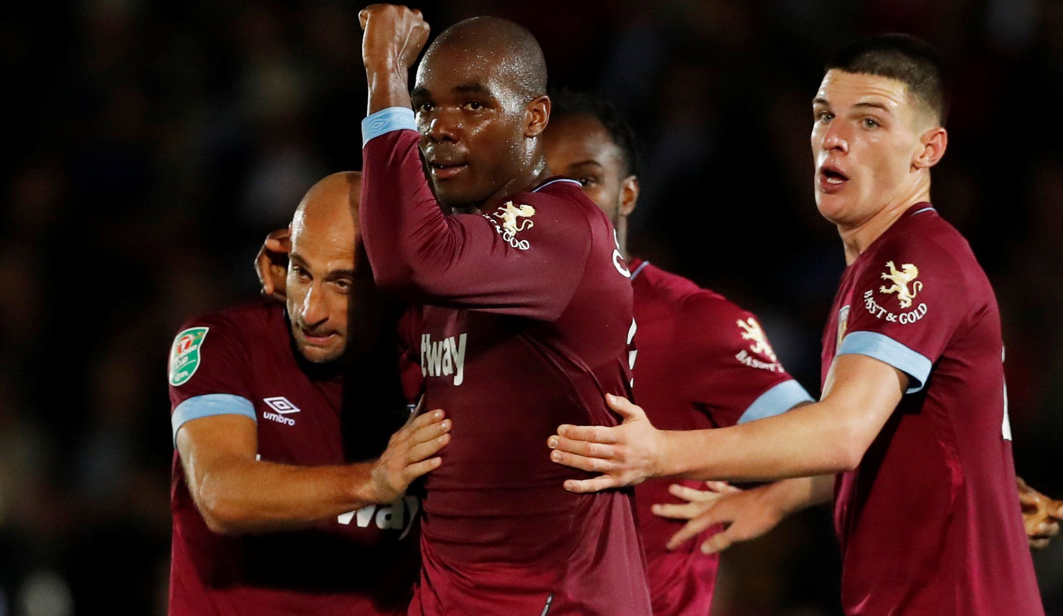 Soccer Football - Carabao Cup Second Round - AFC Wimbledon v West Ham United - The Cherry Red Records Stadium, London, Britain - August 28, 2018  West Ham's Angelo Ogbonna celebrates scoring their second goal with team mates    Action Images via Reuters/Matthew Childs  EDITORIAL USE ONLY. No use with unauthorized audio, video, data, fixture lists, club/league logos or 