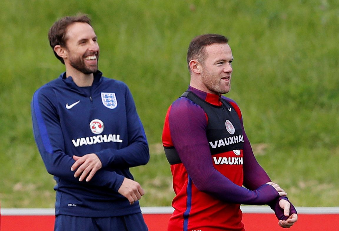 FILE PHOTO: Britain Soccer Football - England Training - St. George’s Park, Burton upon Trent - 7/10/16 England interim manager Gareth Southgate and Wayne Rooney during training Action Images via Reuters / Carl Recine