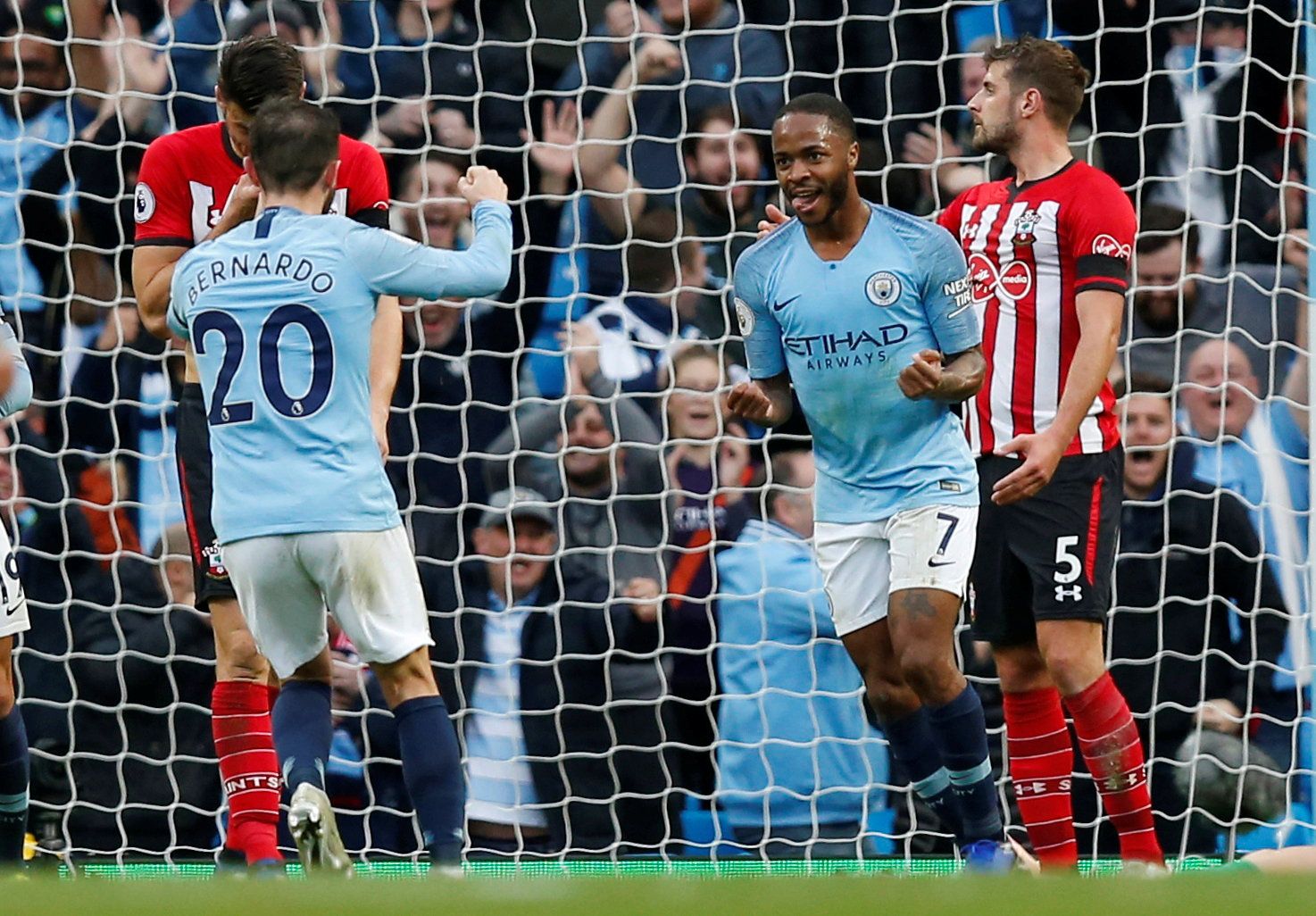 Soccer Football - Premier League - Manchester City v Southampton - Etihad Stadium, Manchester, Britain - November 4, 2018  Manchester City's Raheem Sterling celebrates scoring their fourth goal with team mates   REUTERS/Andrew Yates  EDITORIAL USE ONLY. No use with unauthorized audio, video, data, fixture lists, club/league logos or "live" services. Online in-match use limited to 75 images, no video emulation. No use in betting, games or single club/league/player publications.  Please contact yo