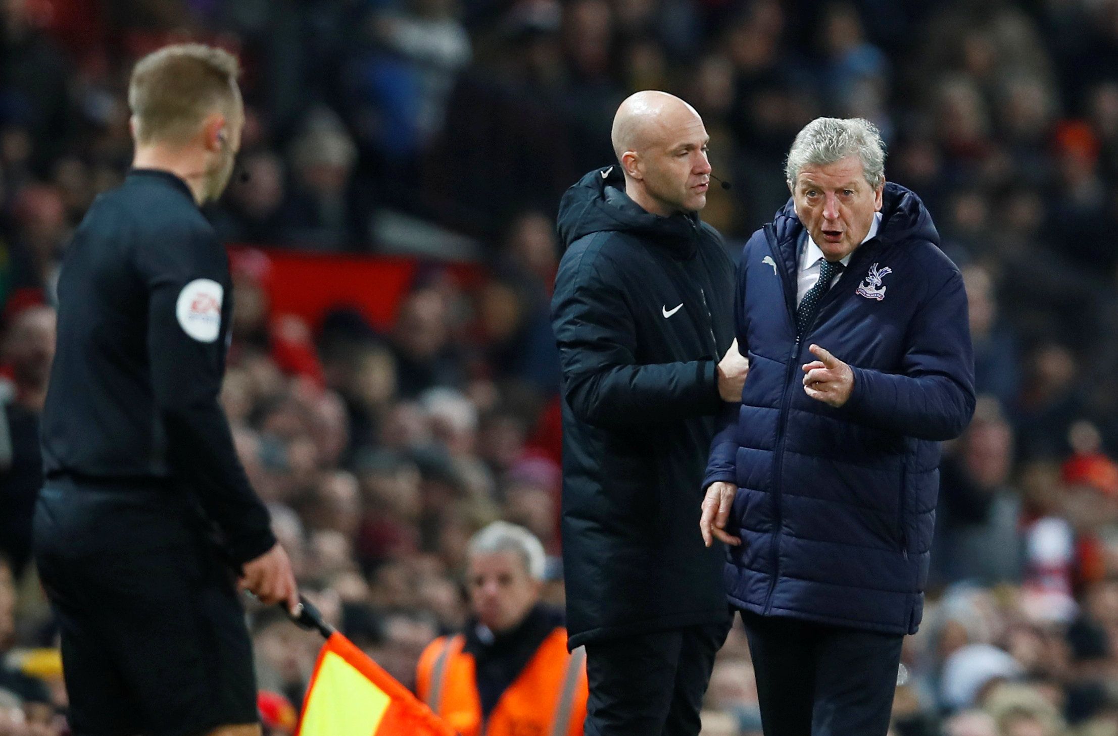 Crystal Palace manager Roy Hodgson reacts to the assistant referee away to Manchester United